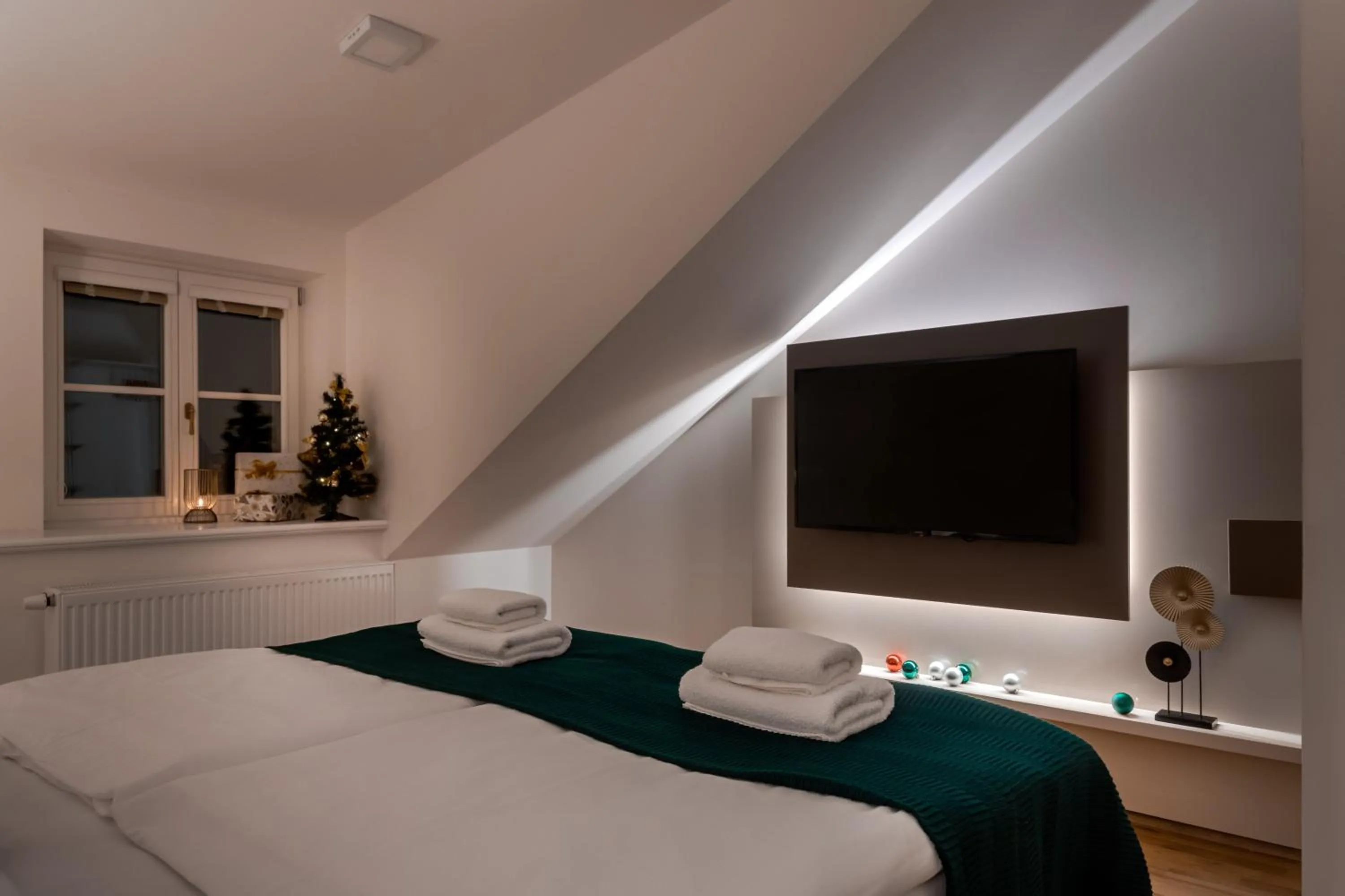 Bed in Louren Apartments