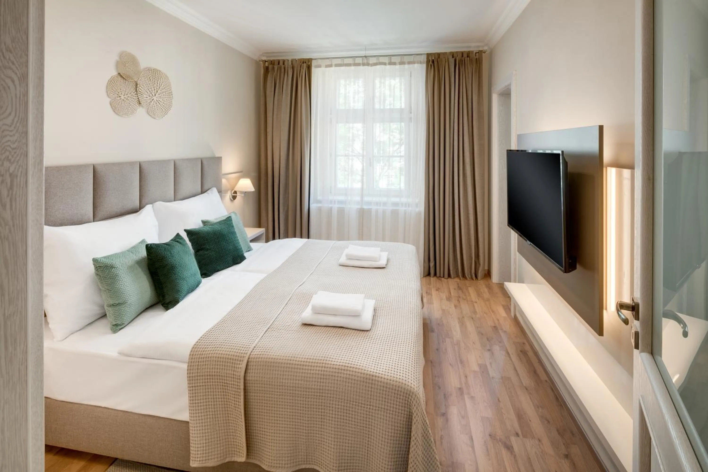 Bed in Louren Apartments