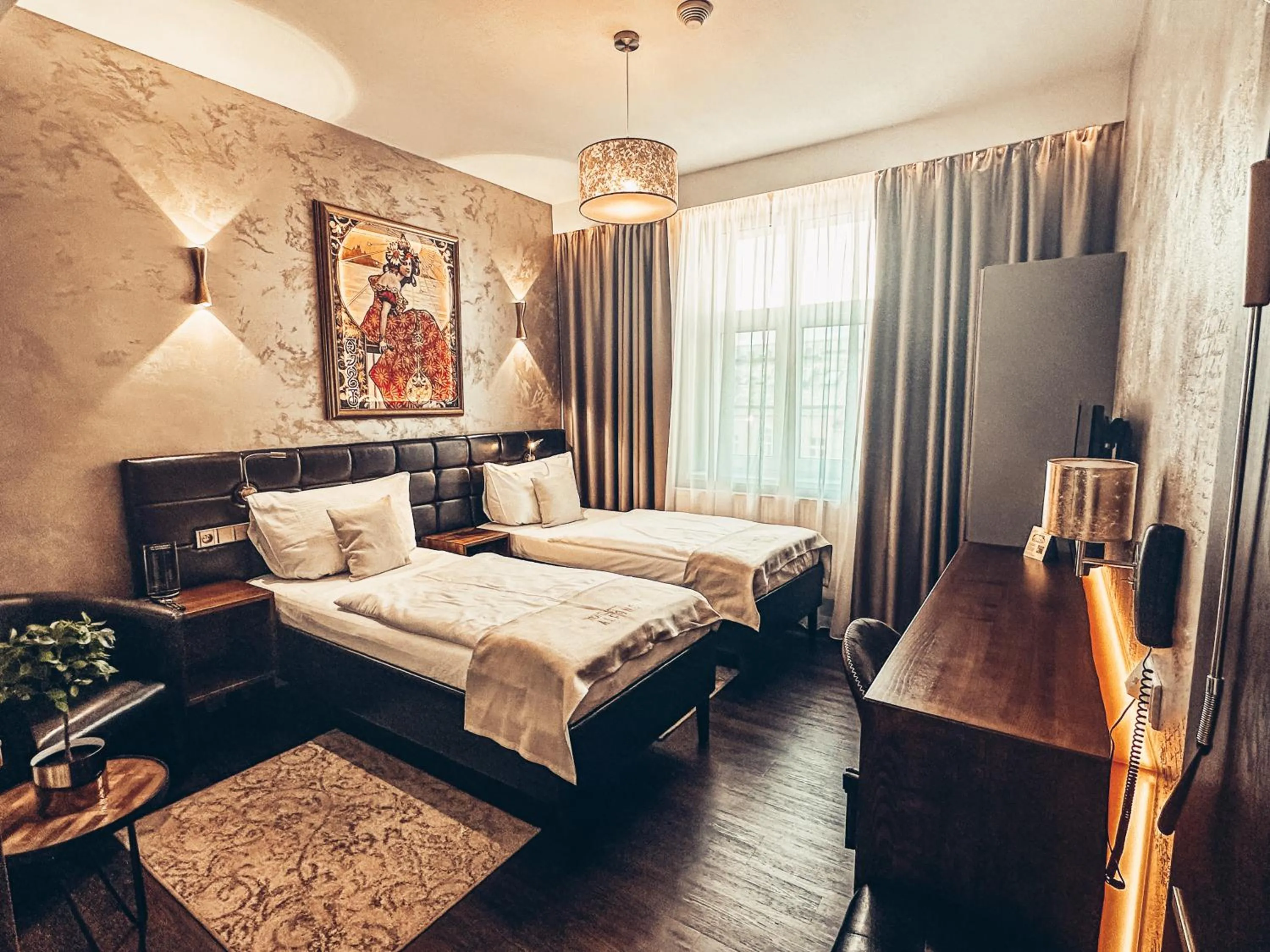 Bed in Alfons Boutique Hotel