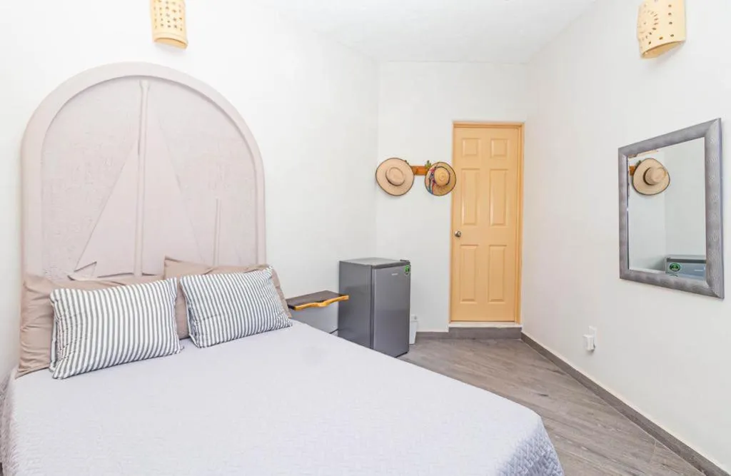 Bed in Hotel Bahia Huatulco