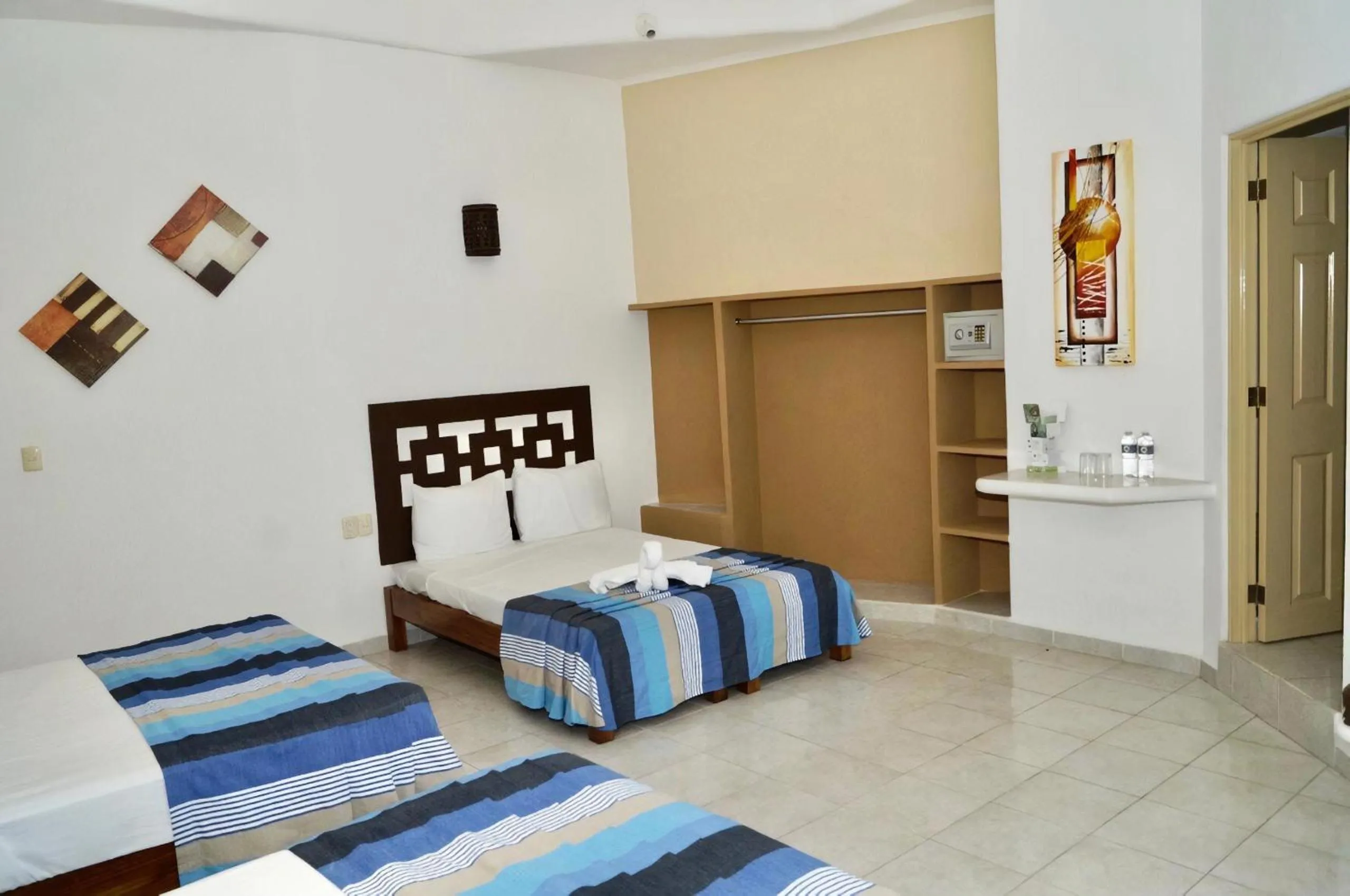 Bed in Hotel Bahia Huatulco