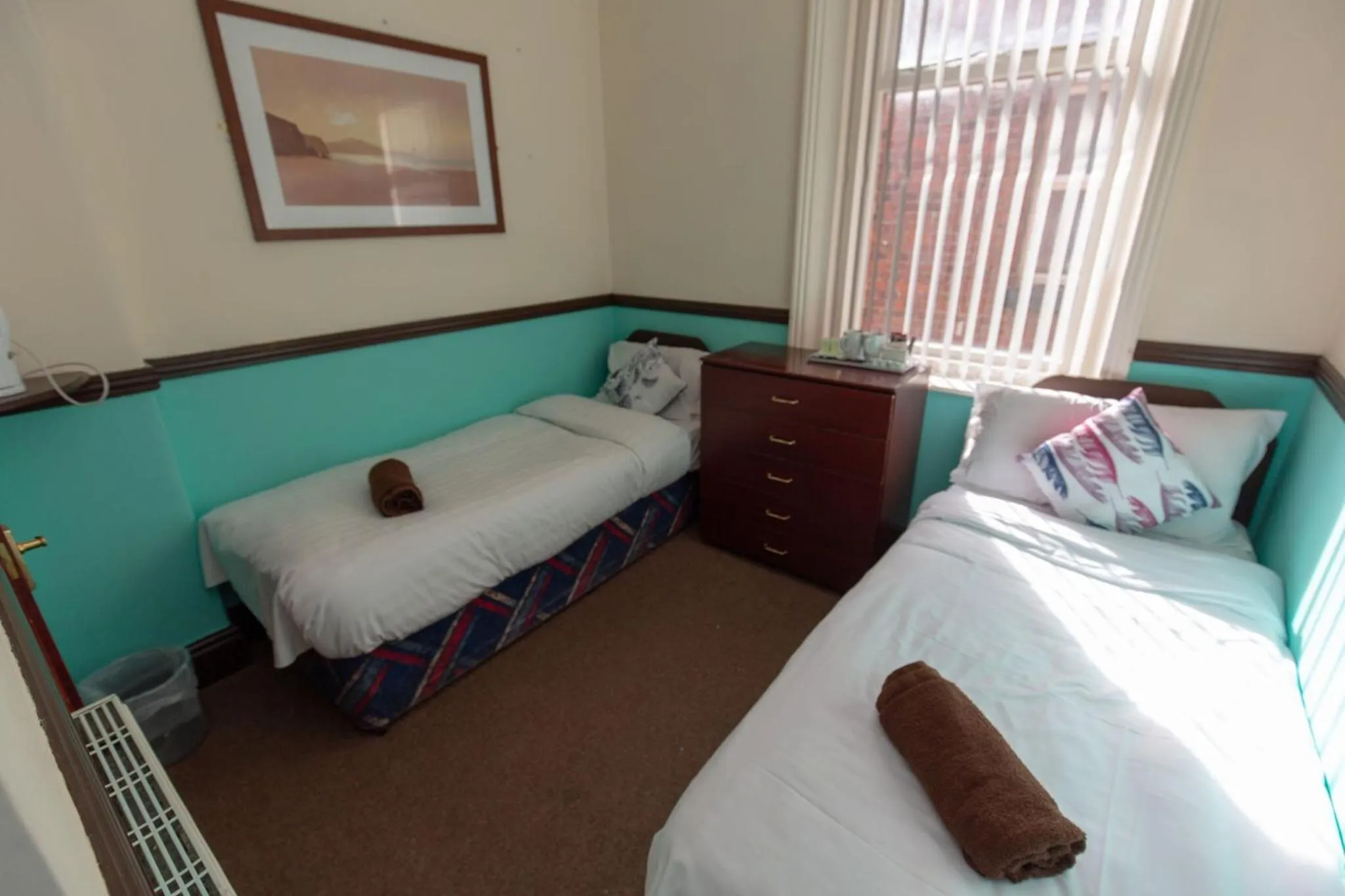 Bed in The Riviera Hotel