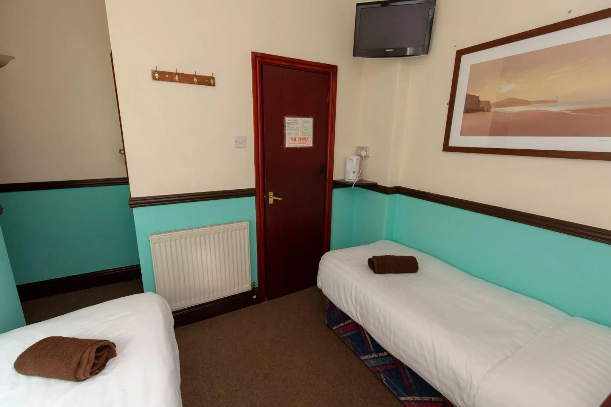 Bed in The Riviera Hotel