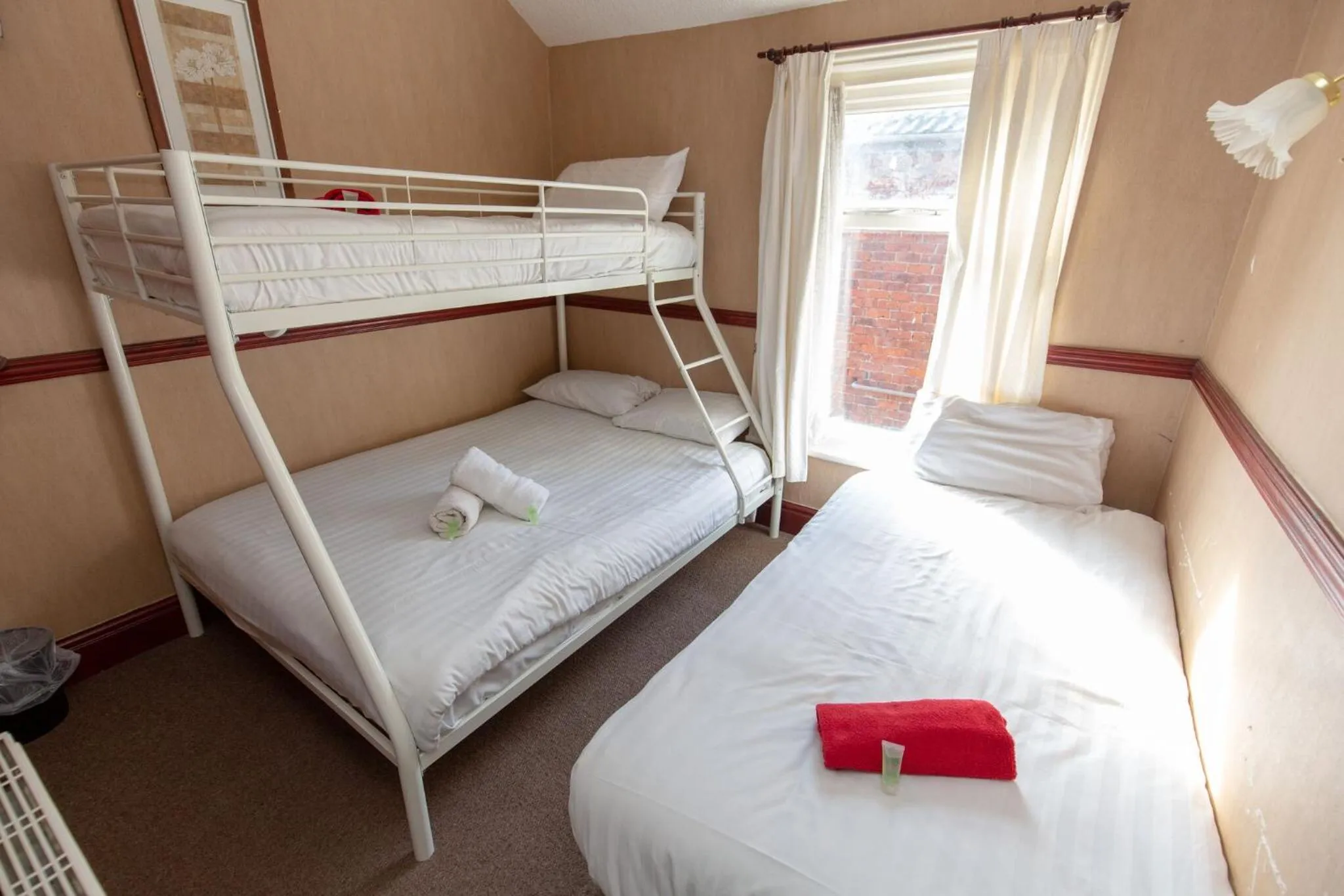 Bed in The Riviera Hotel