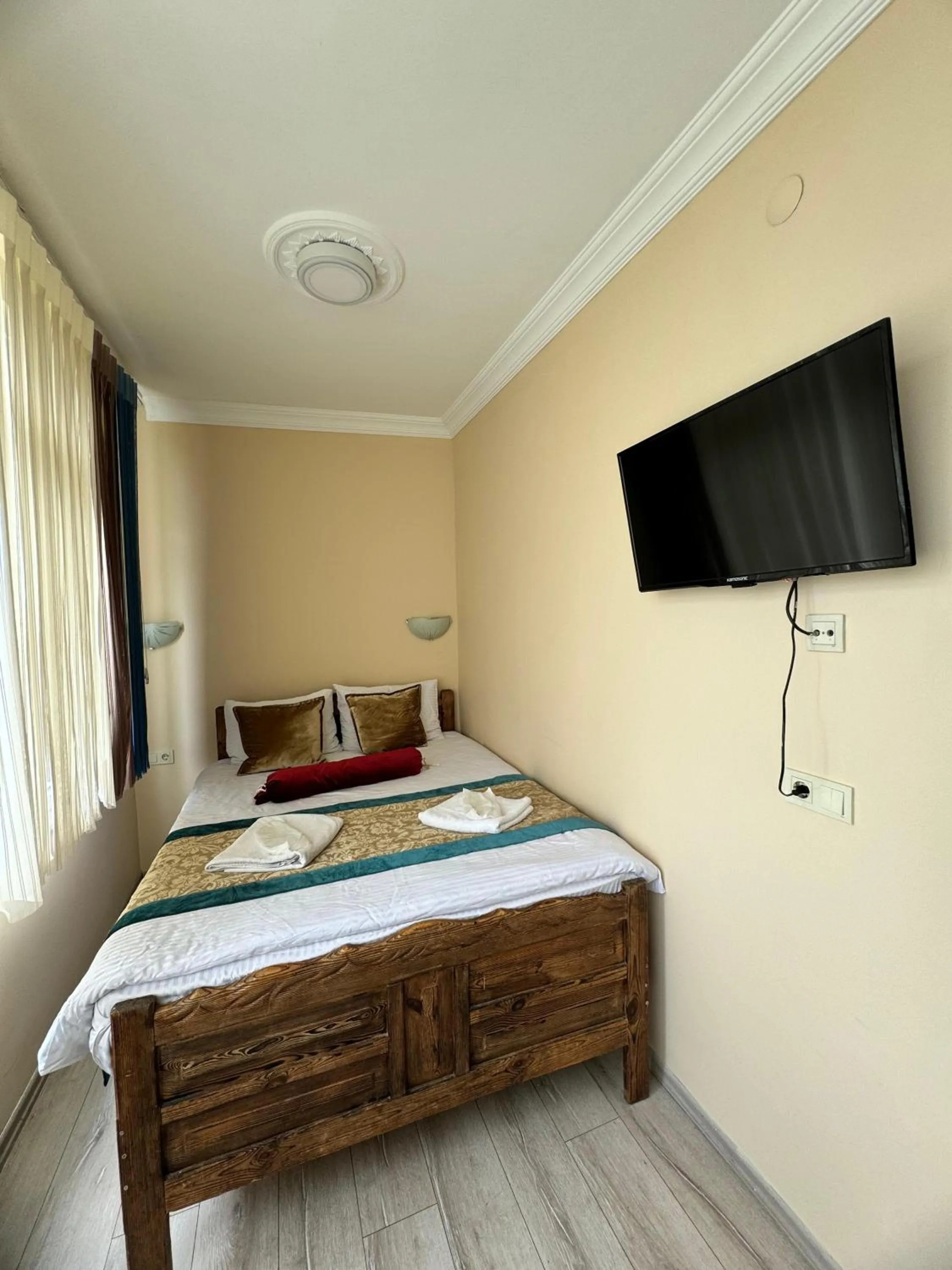Property building, Bed in Happy Suite Boutique Hotel