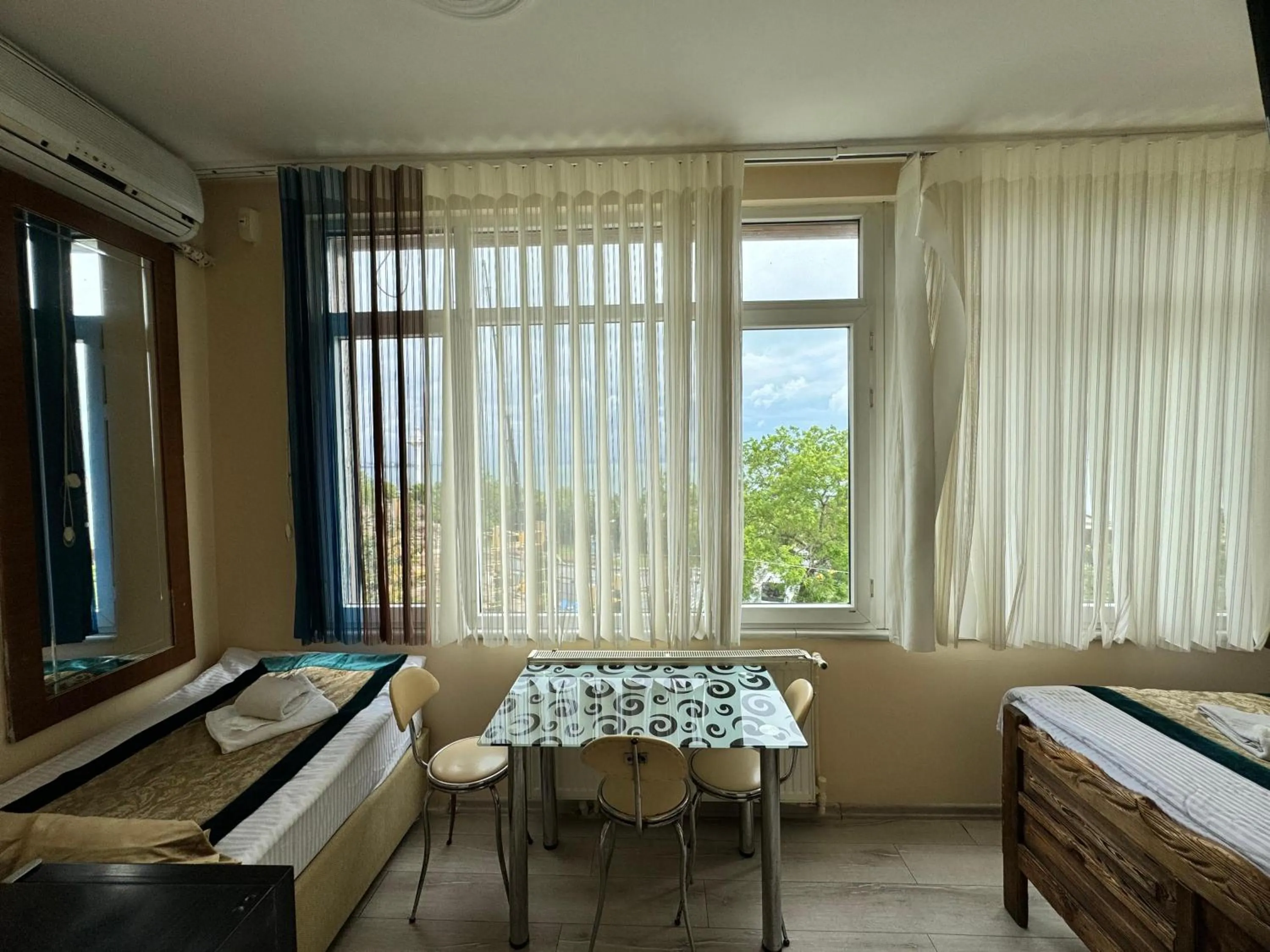 Property building in Happy Suite Boutique Hotel