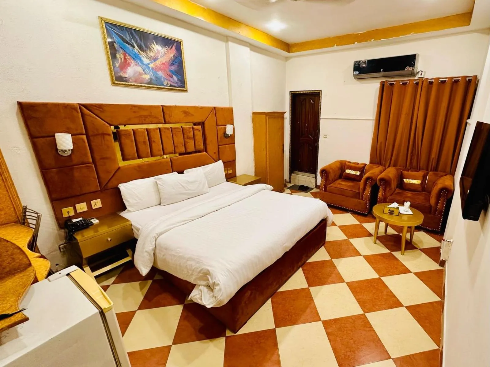 Photo of the whole room, Bed in Fiesta Inn Hotel & Resorts Multan