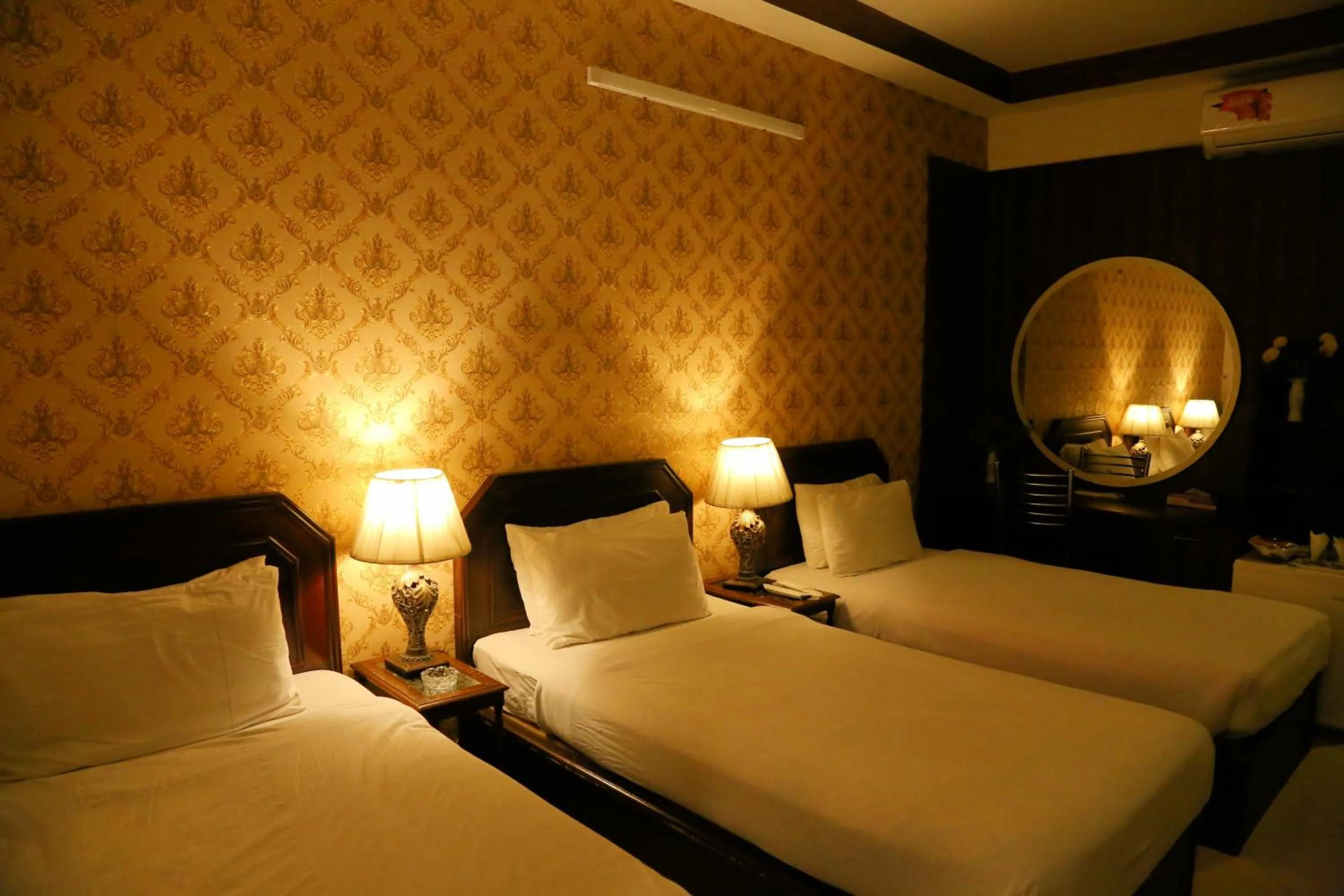 Bed in Fiesta Inn Hotel & Resorts Multan