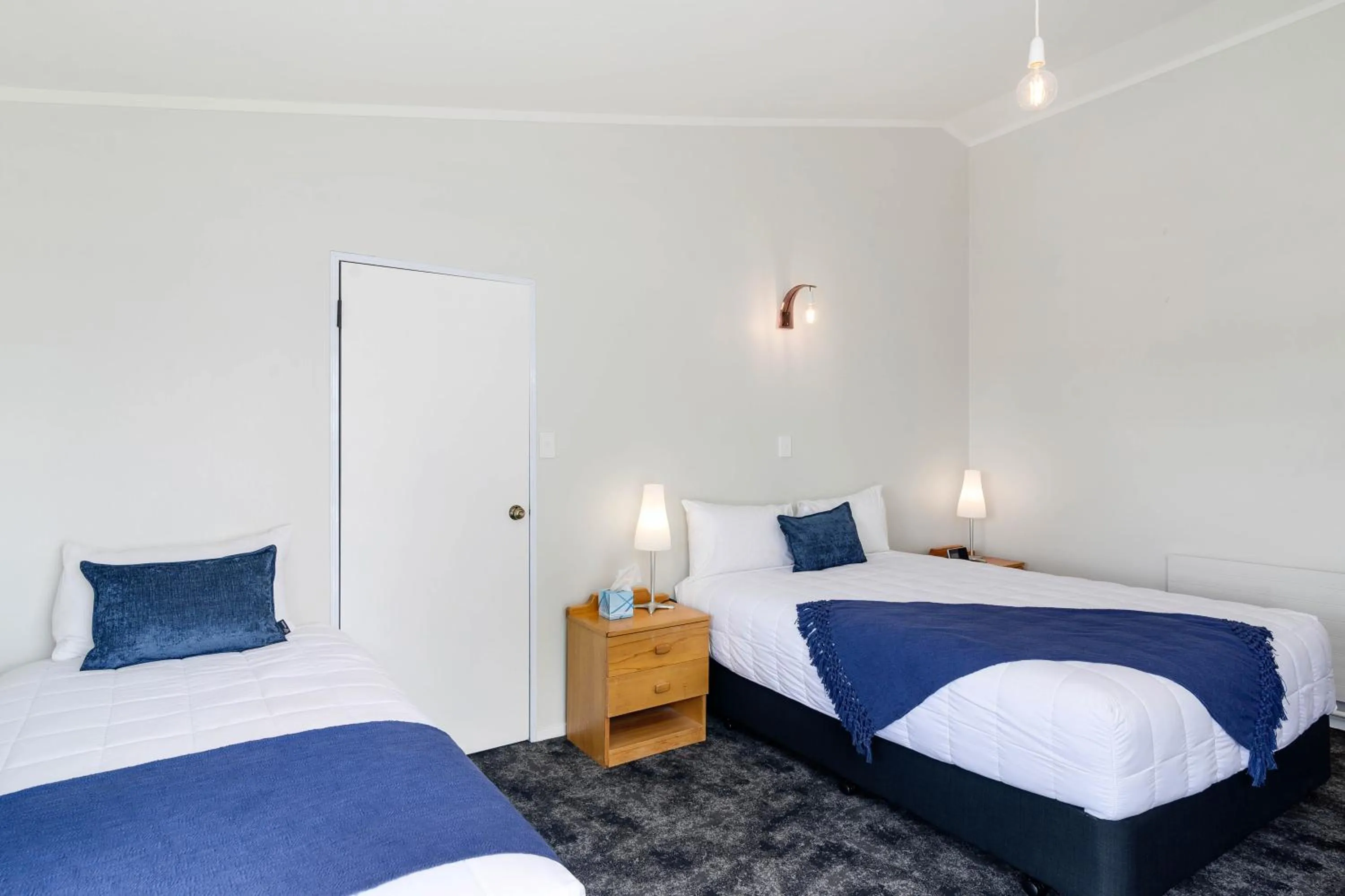 Bed in Lake Lodge Motel Rotorua