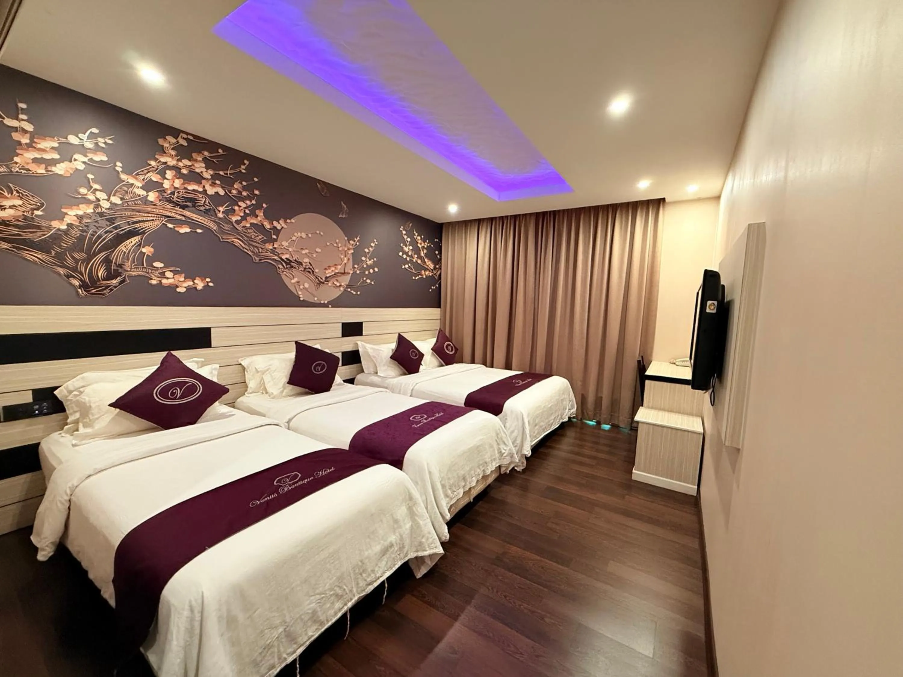 Bed in Venus Boutique Hotel