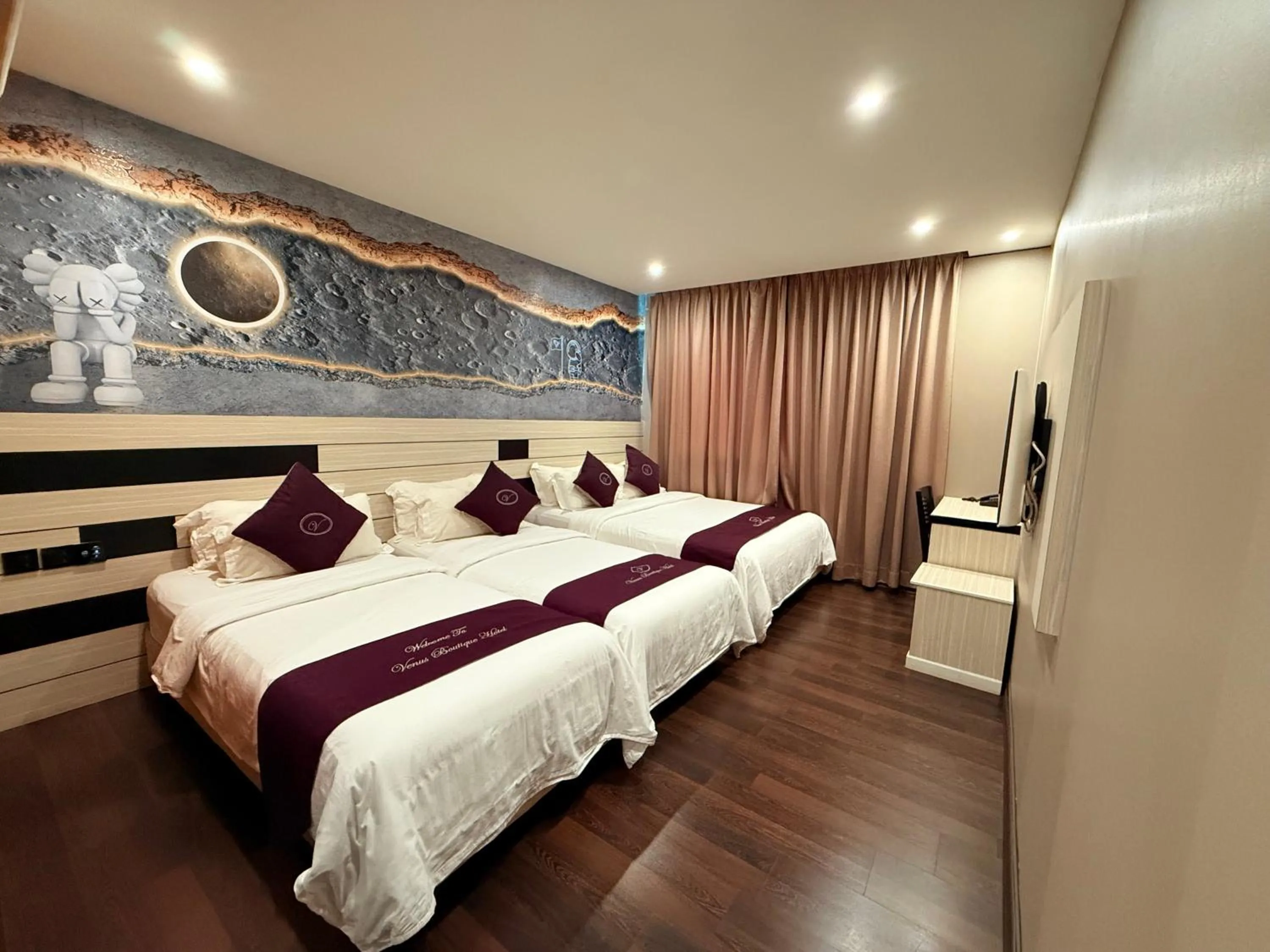 Bed in Venus Boutique Hotel