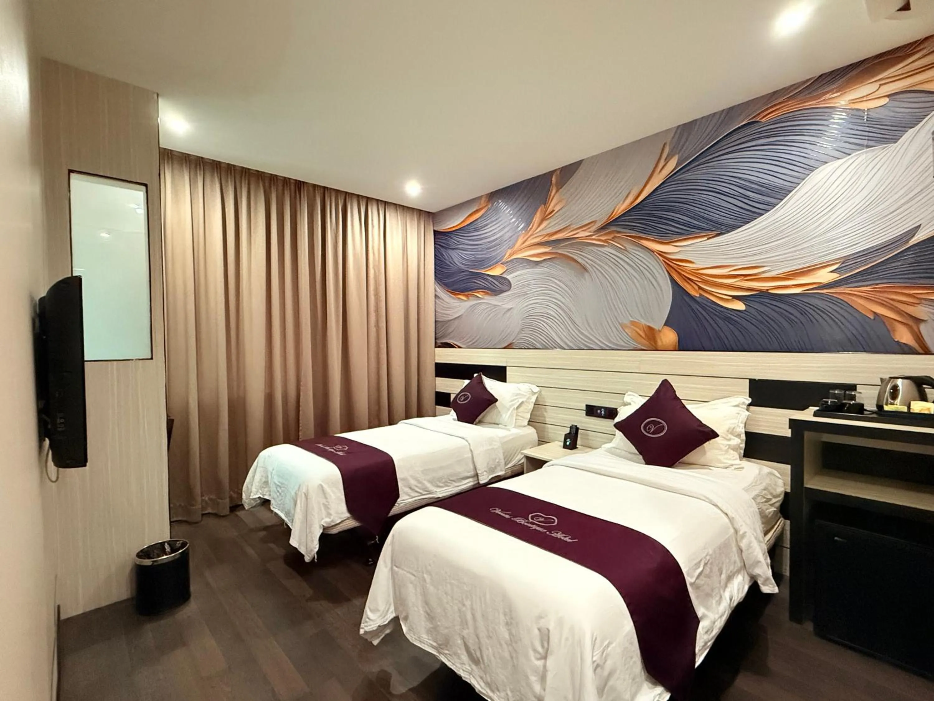 Bed in Venus Boutique Hotel