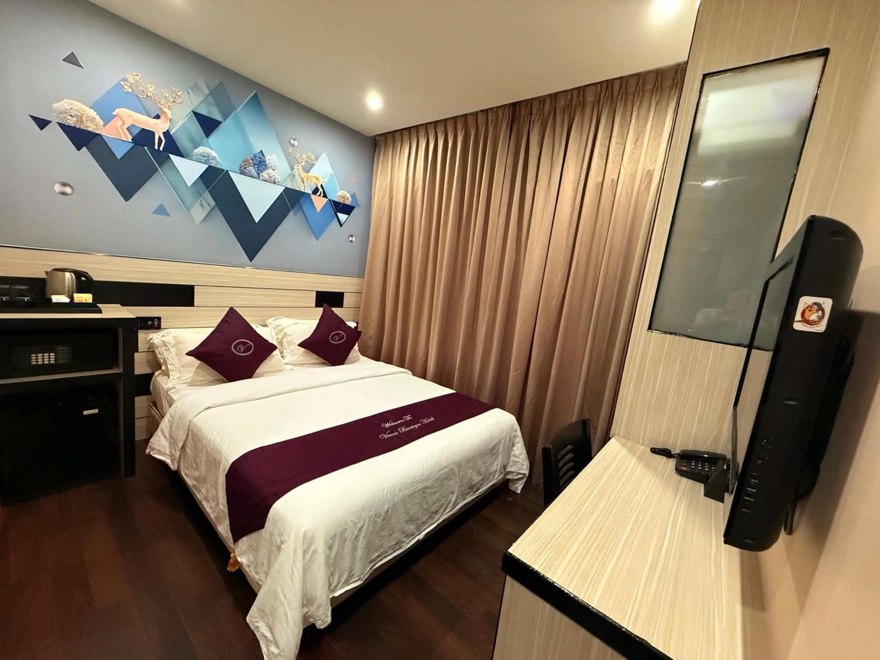 Bed in Venus Boutique Hotel