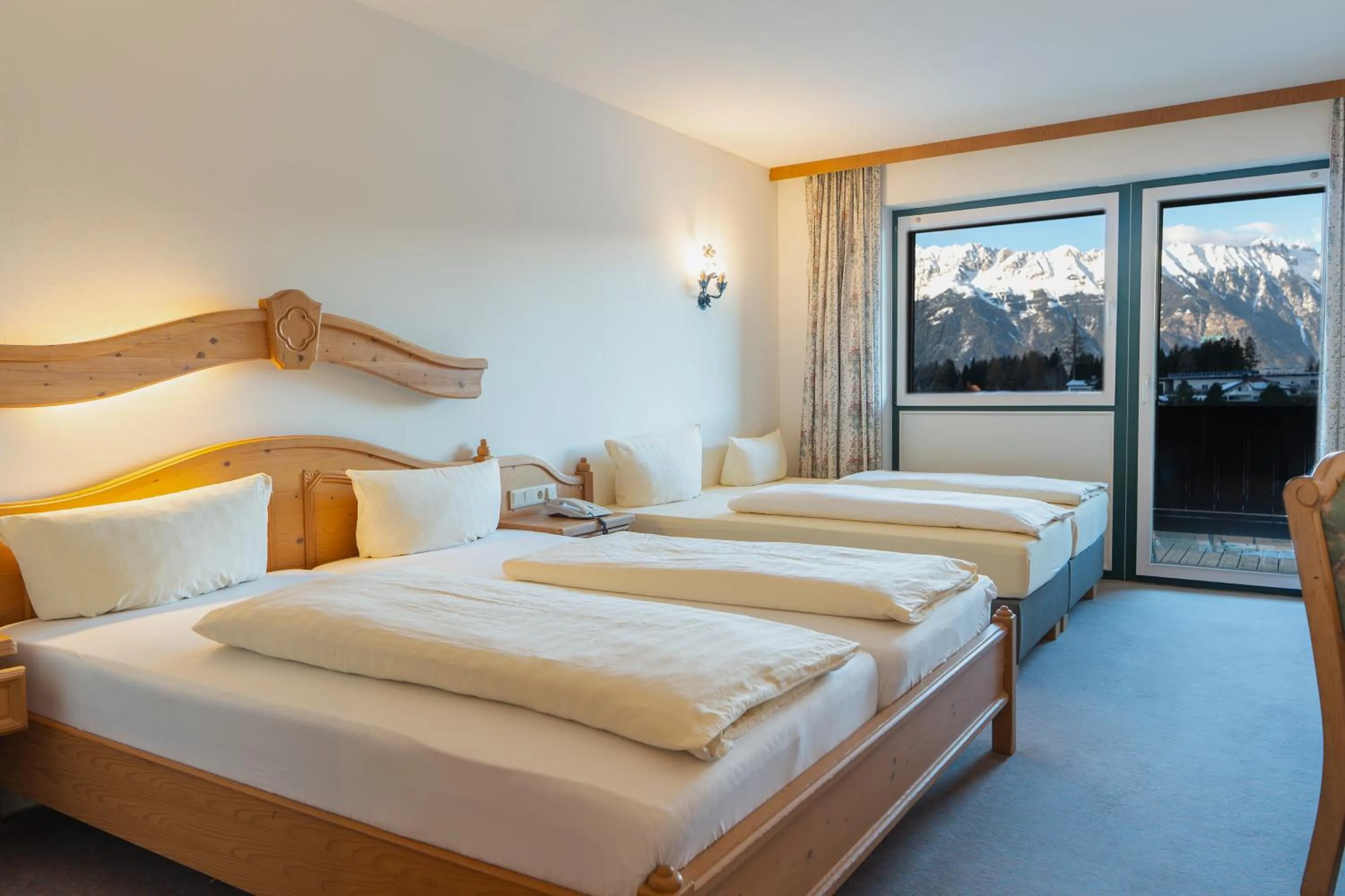 Photo of the whole room, Bed in Hotel Gruberhof Innsbruck Igls B&B