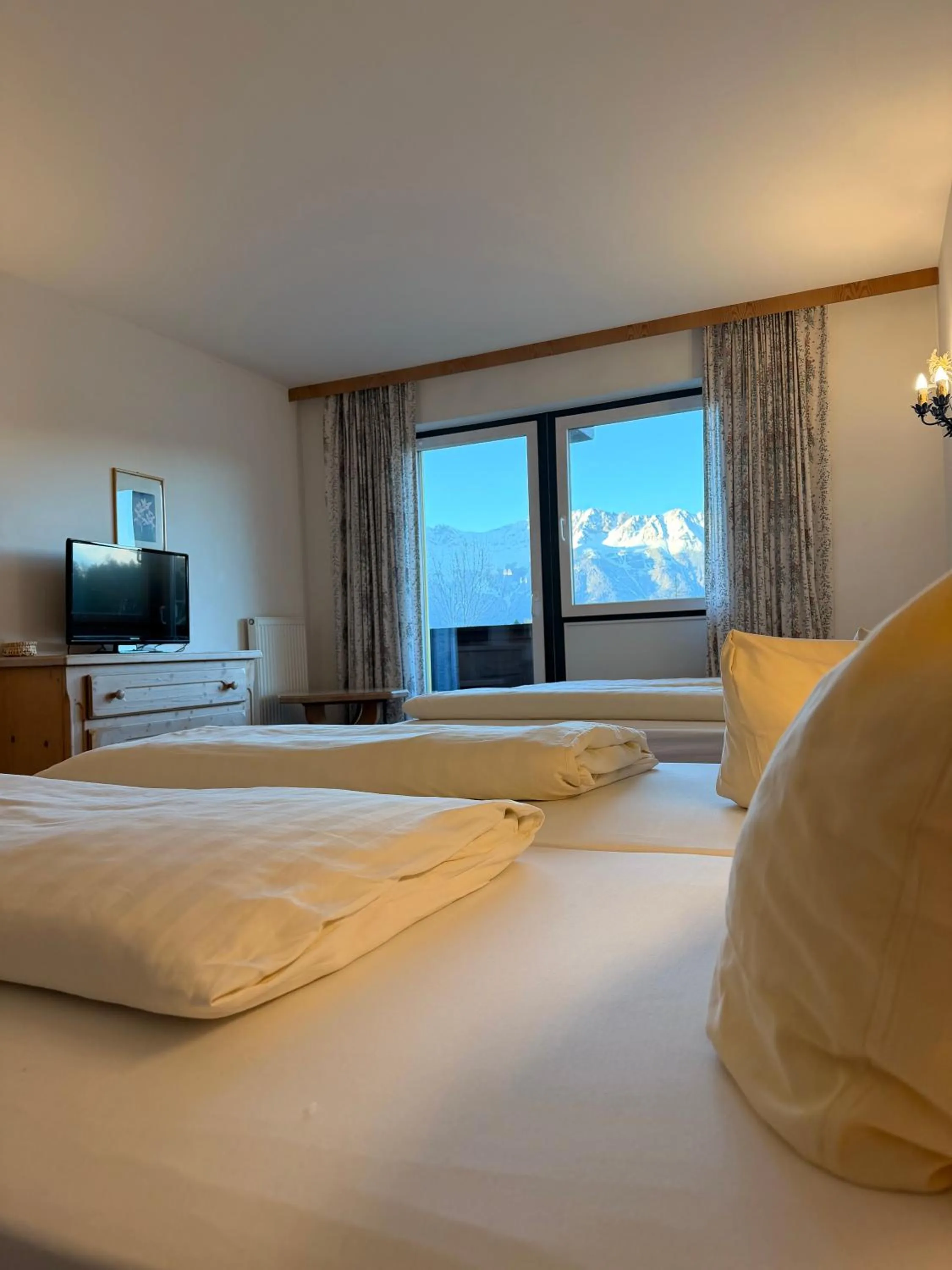 Bed in Hotel Gruberhof Innsbruck Igls B&B