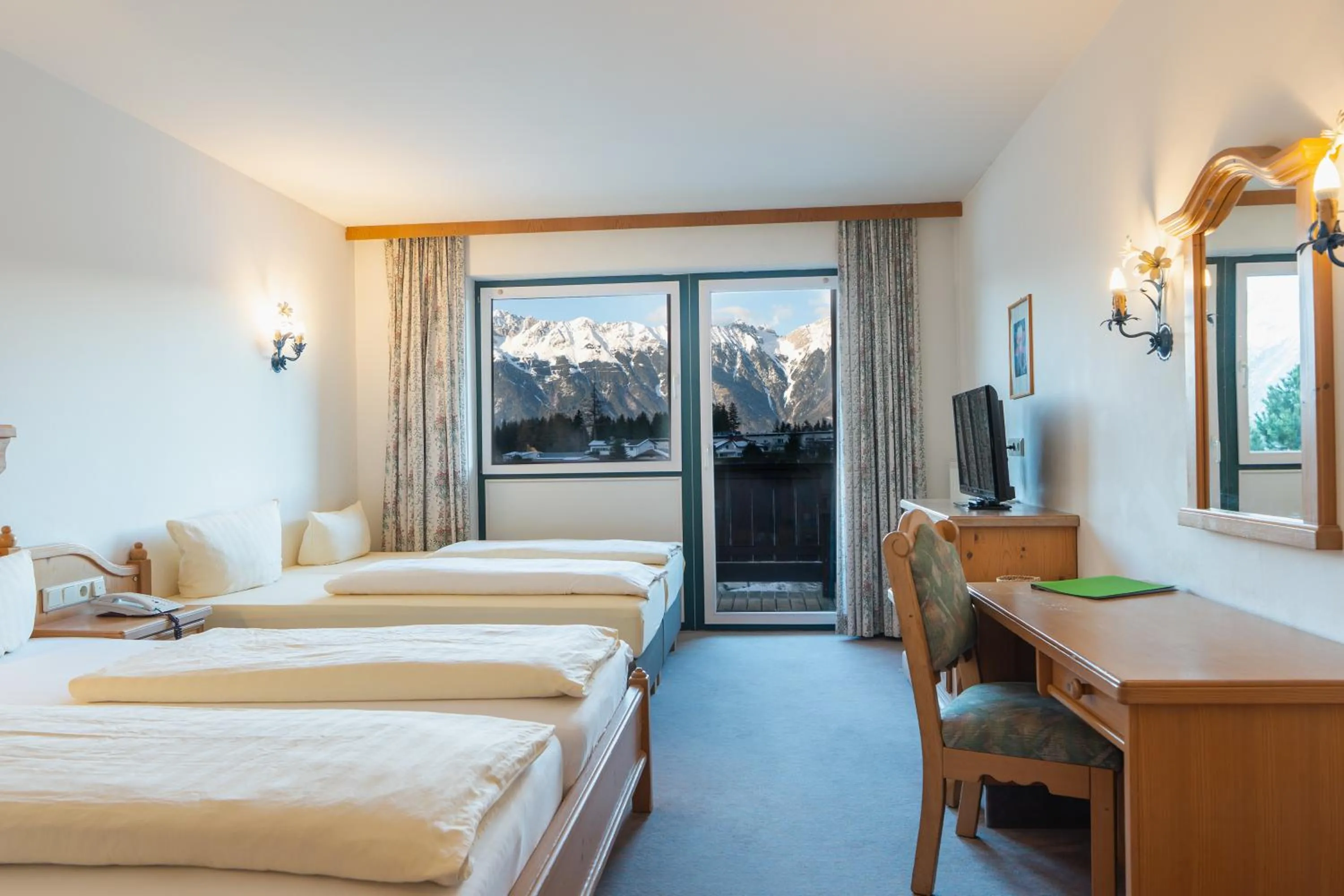 Photo of the whole room, Bed in Hotel Gruberhof Innsbruck Igls B&B