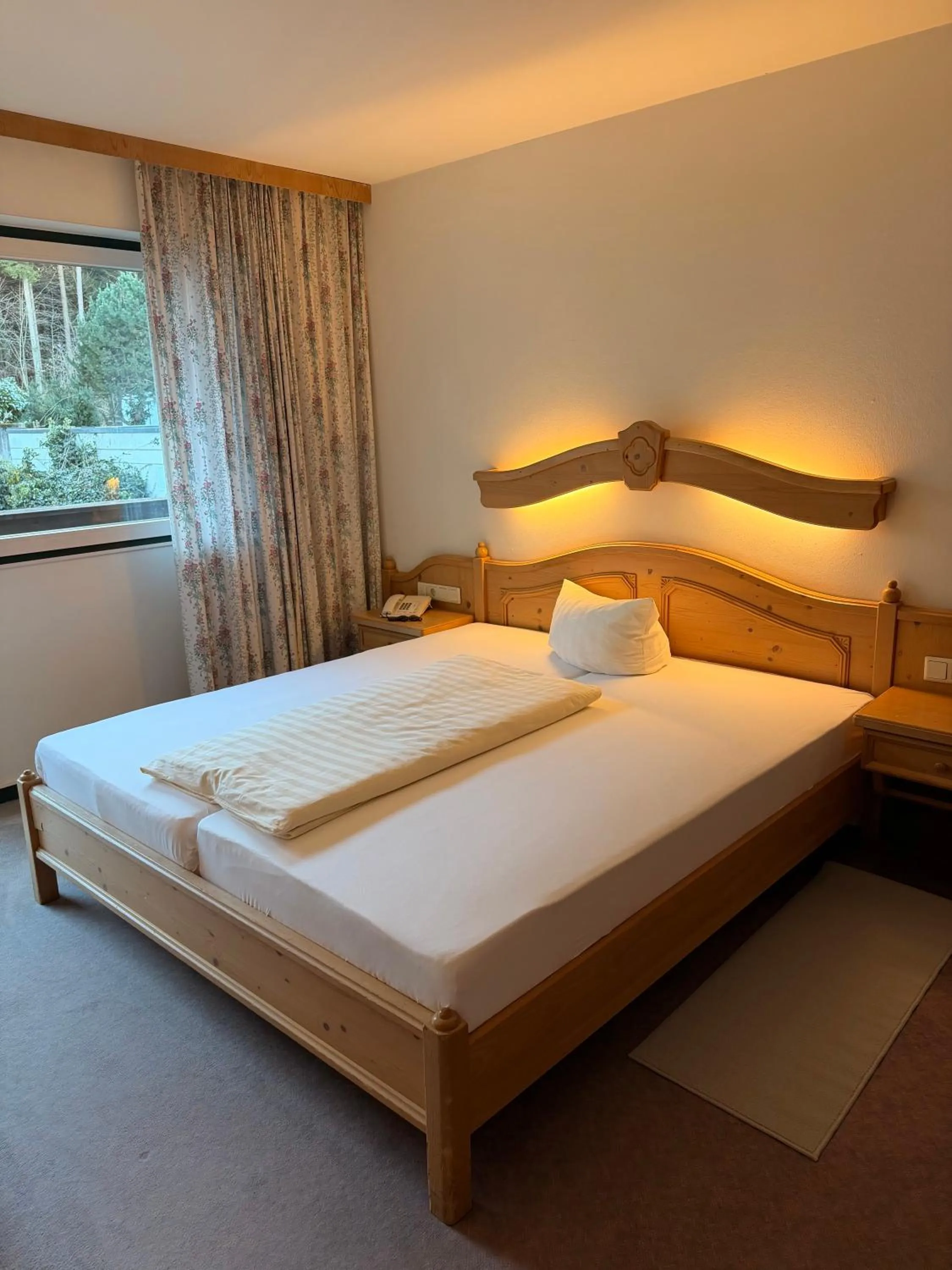 Bed in Hotel Gruberhof Innsbruck Igls B&B