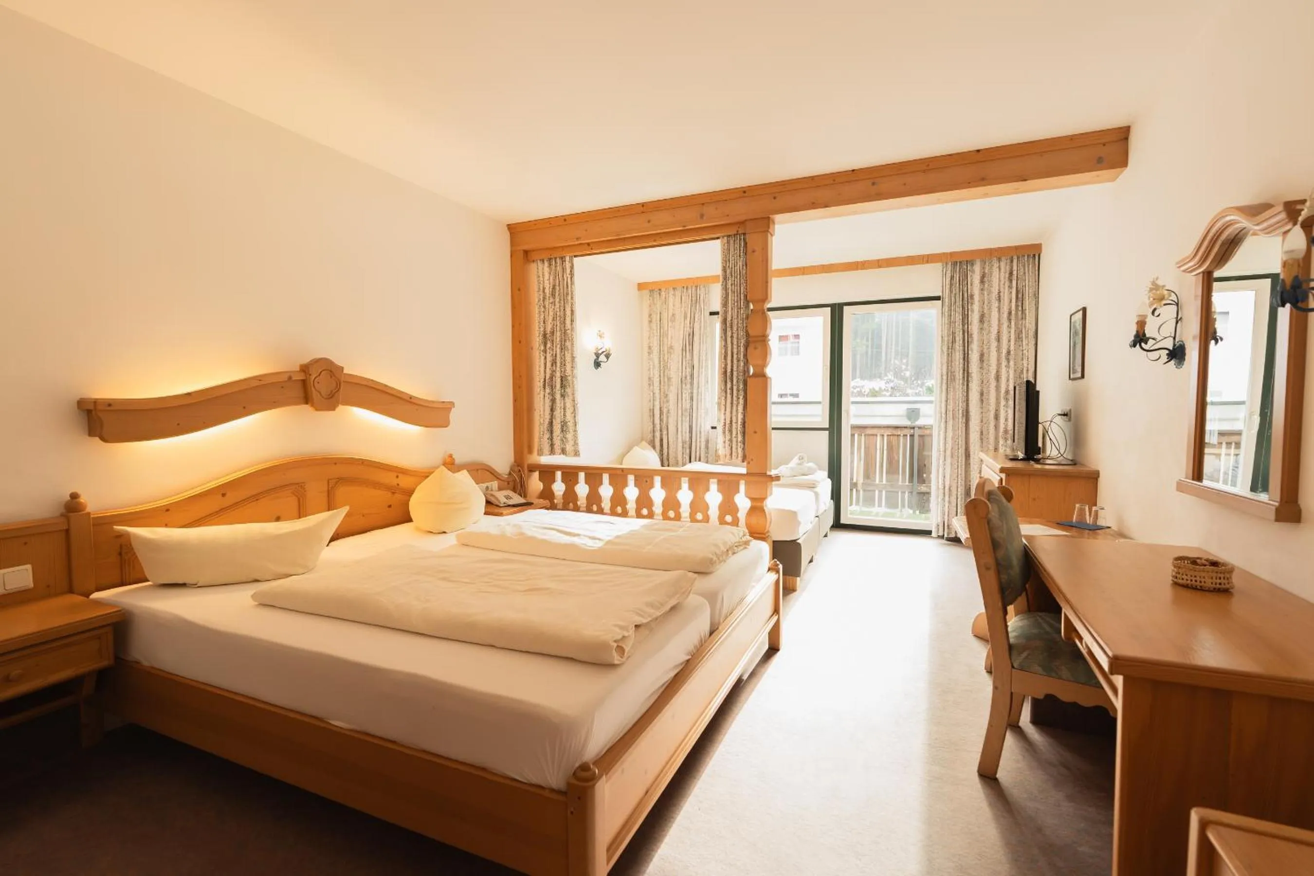 Bedroom, Bed in Hotel Gruberhof Innsbruck Igls B&B