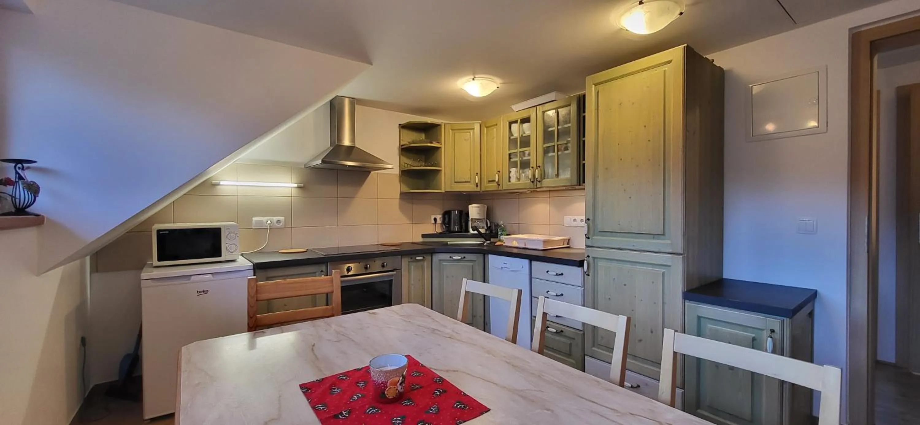 Kitchen or kitchenette in Apartments & Hostel Bohinj