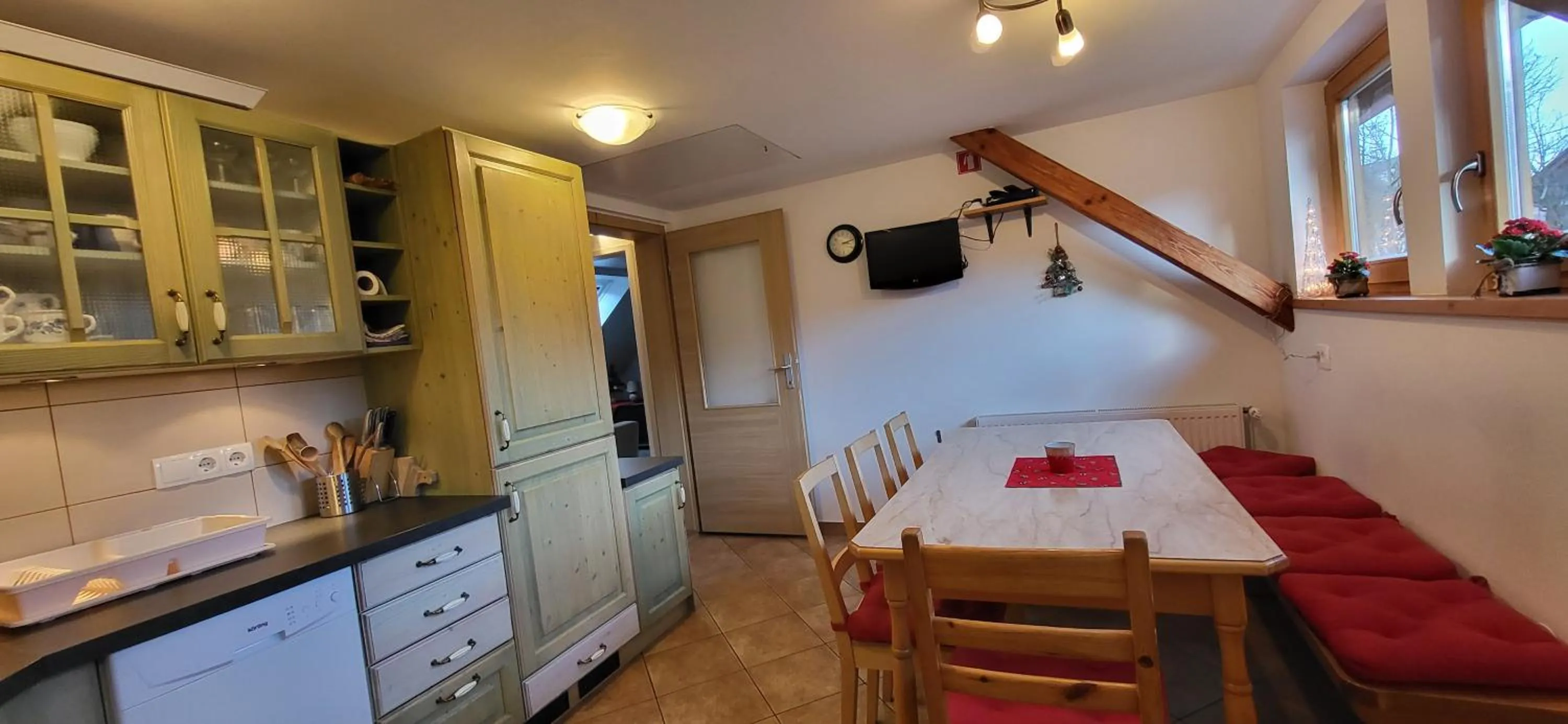 Kitchen or kitchenette in Apartments & Hostel Bohinj