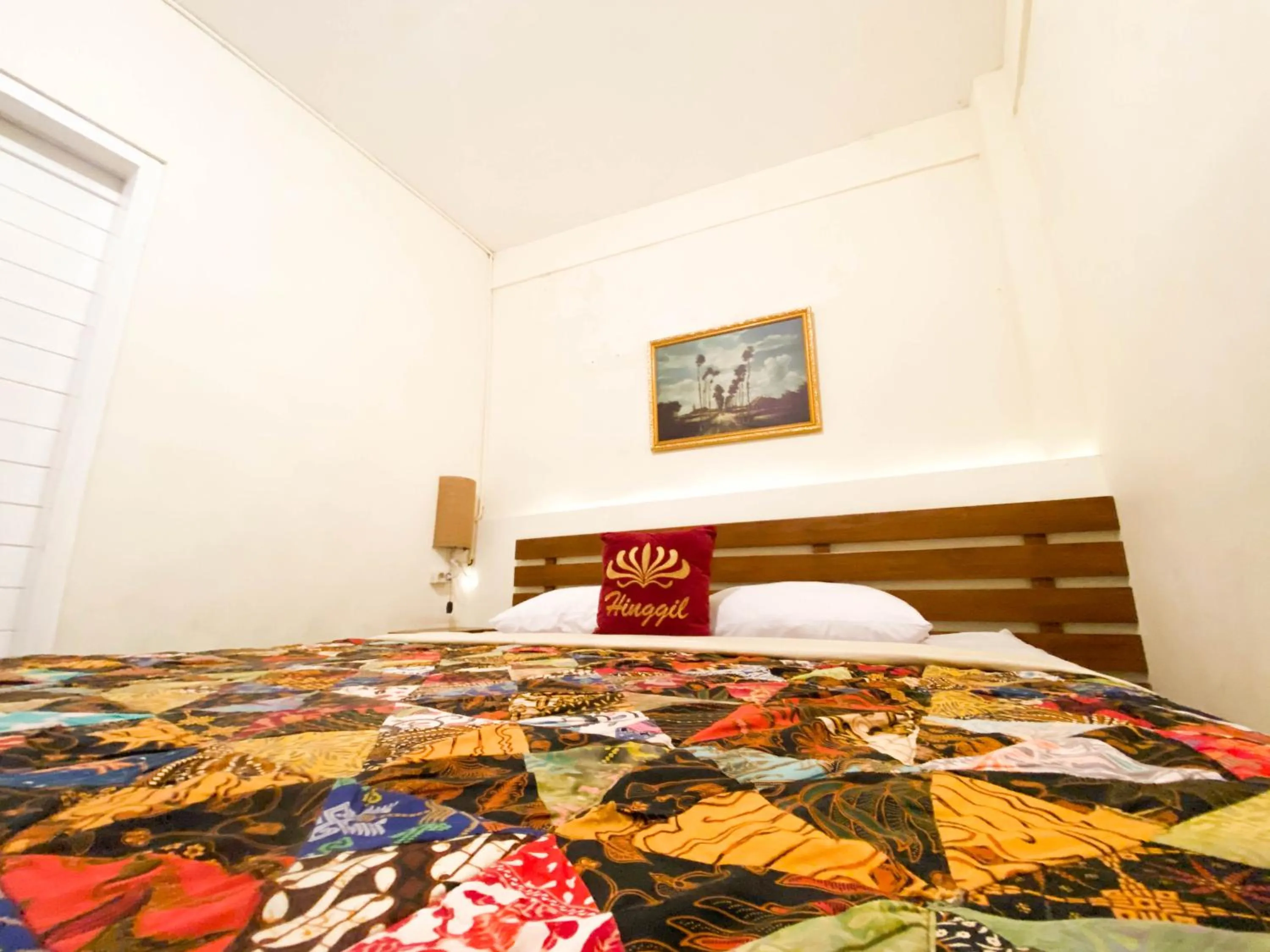 Bed in Hinggil Homestay Syariah Malioboro Yogya Mitra RedDoorz