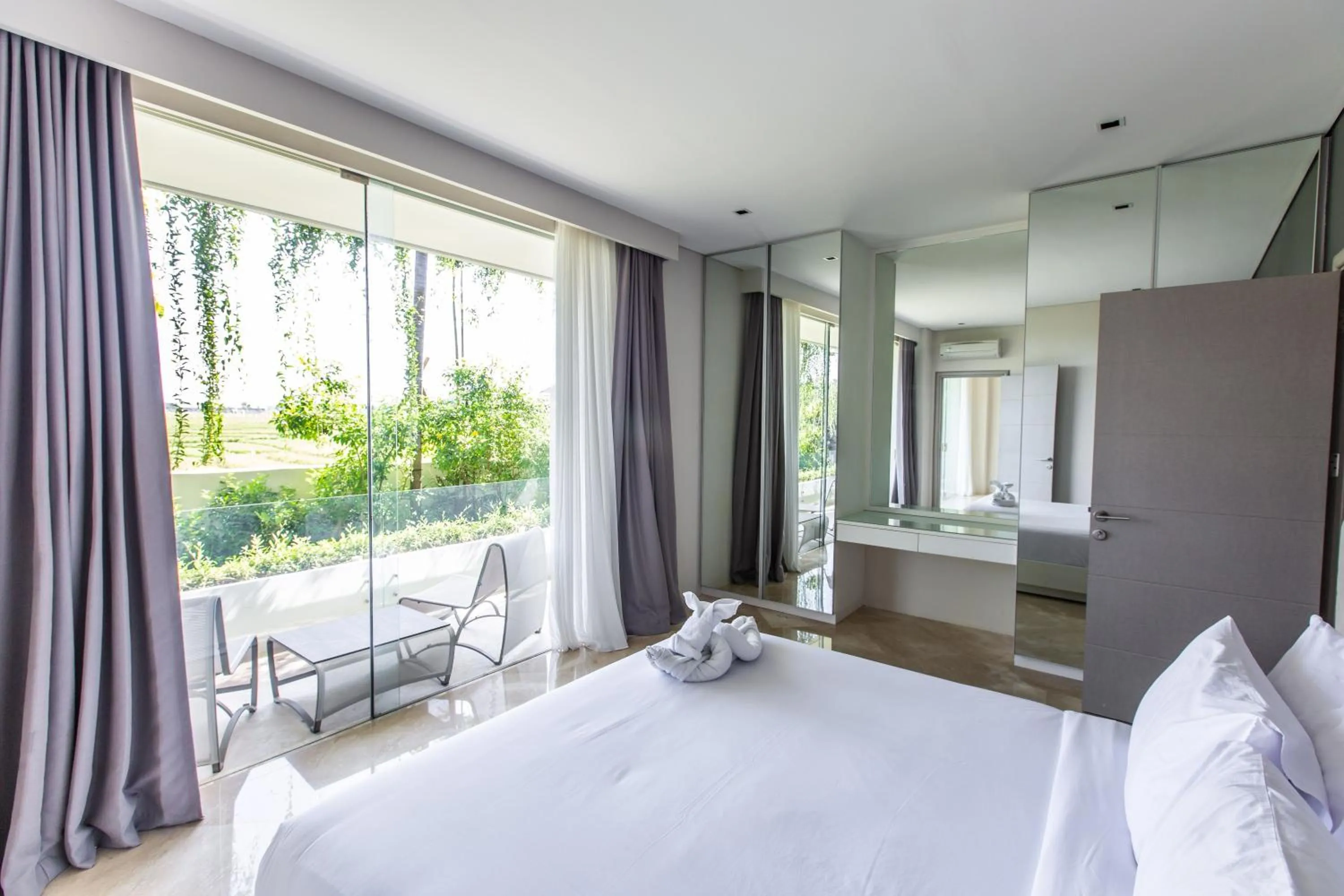Bedroom in The Double View Mansions Bali