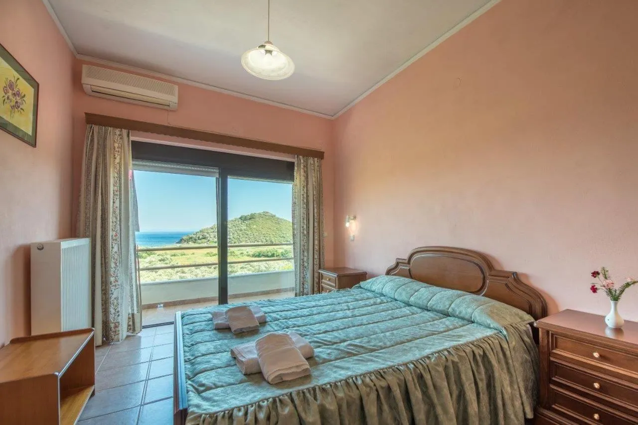 Bed in Blue Bay Hotel