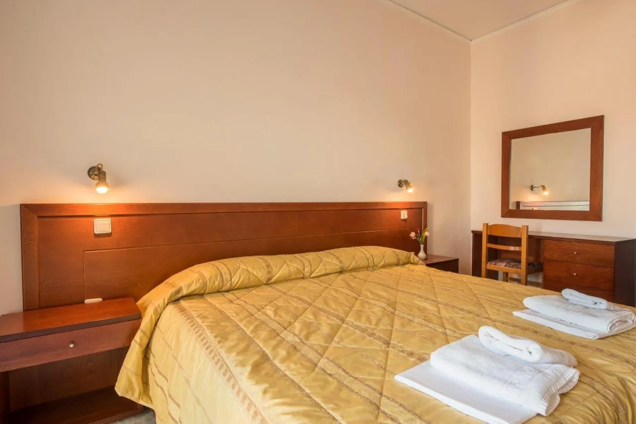 Bed in Blue Bay Hotel