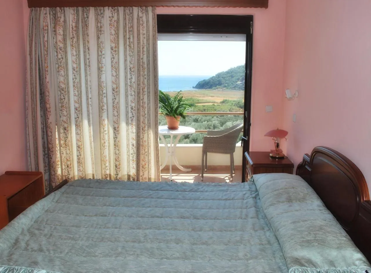 Bed in Blue Bay Hotel