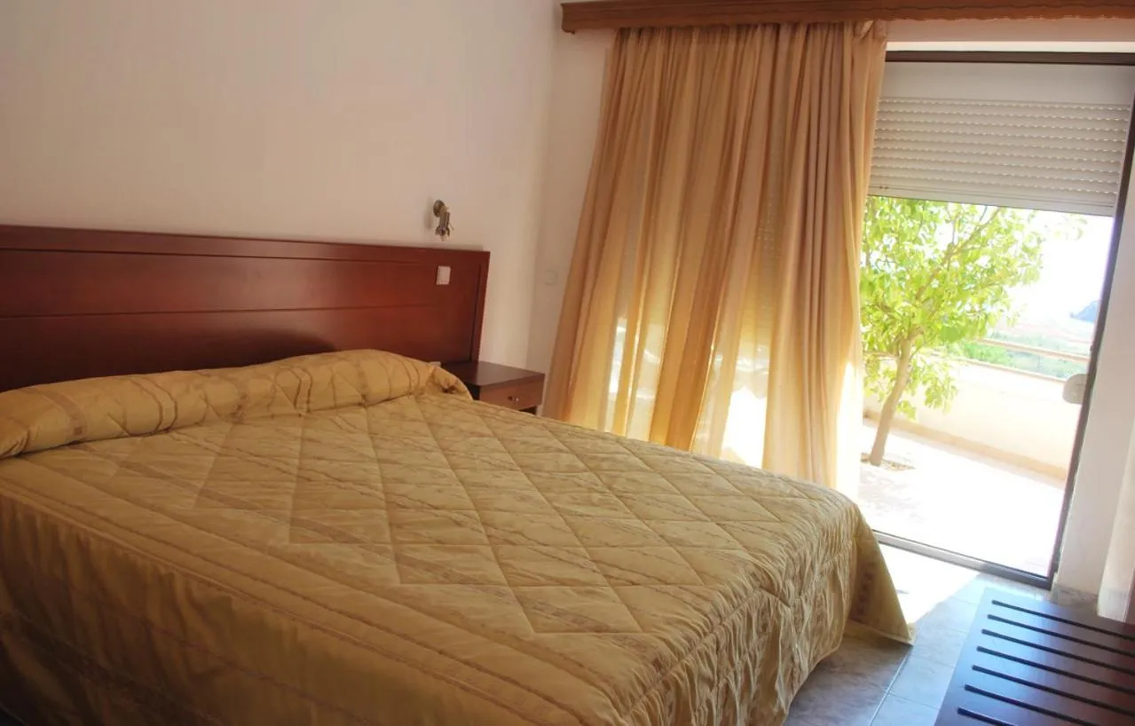 Bed in Blue Bay Hotel