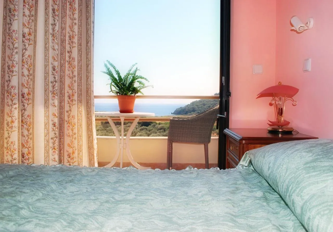 Bed in Blue Bay Hotel