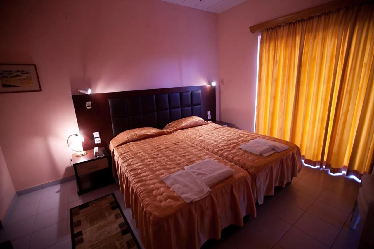 Bed in Blue Bay Hotel