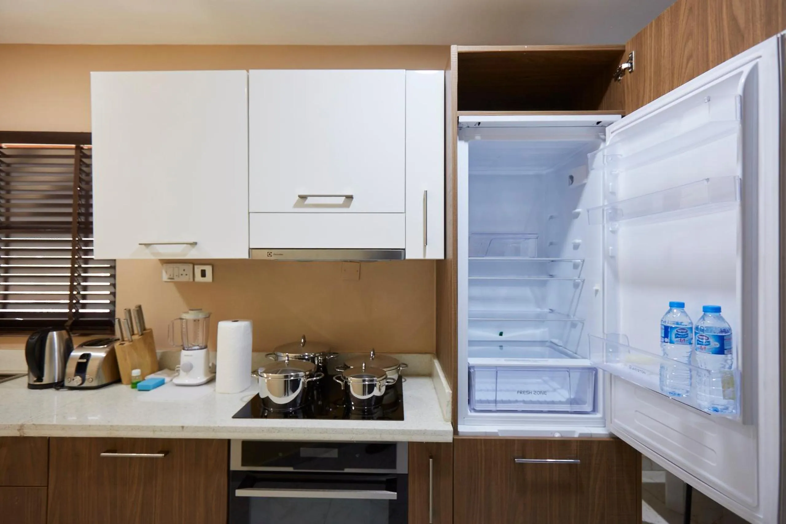 Kitchen or kitchenette in Belanova Apartments and Suites