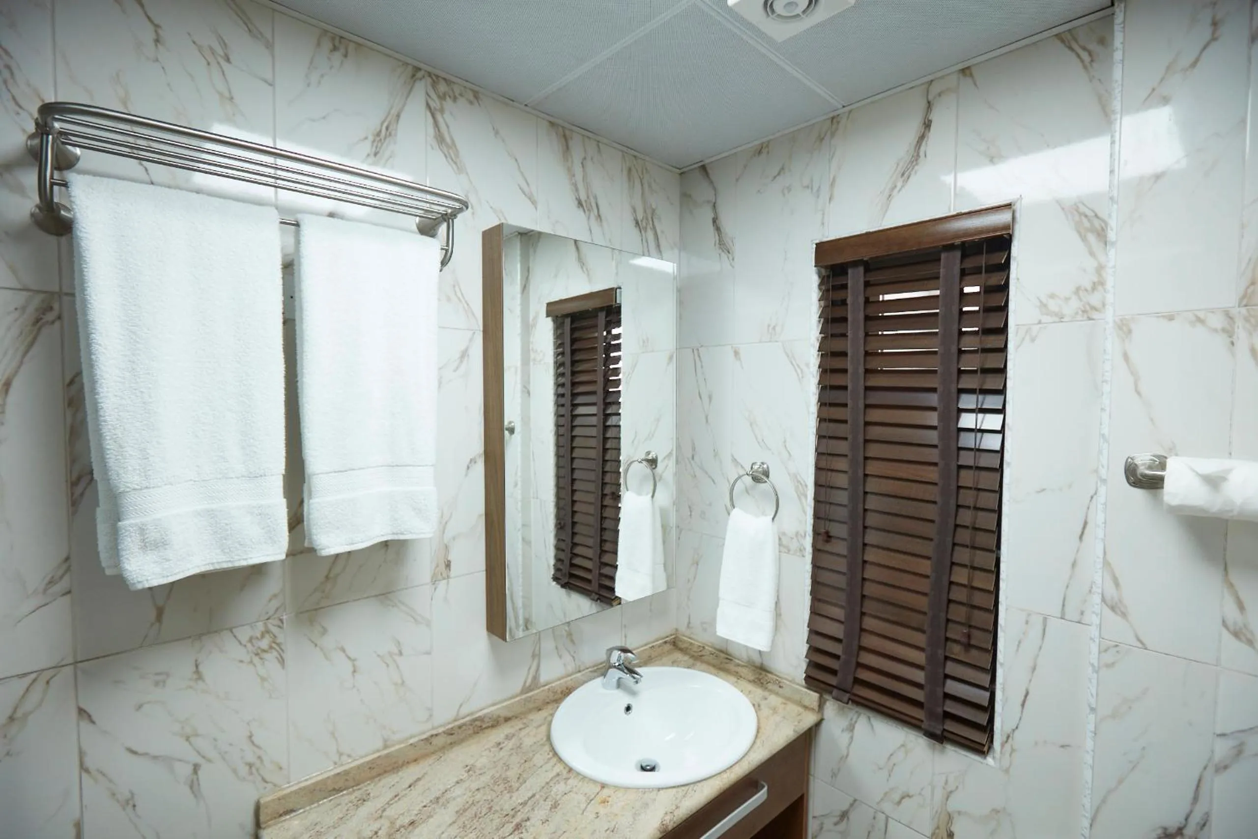 Bathroom in Belanova Apartments and Suites