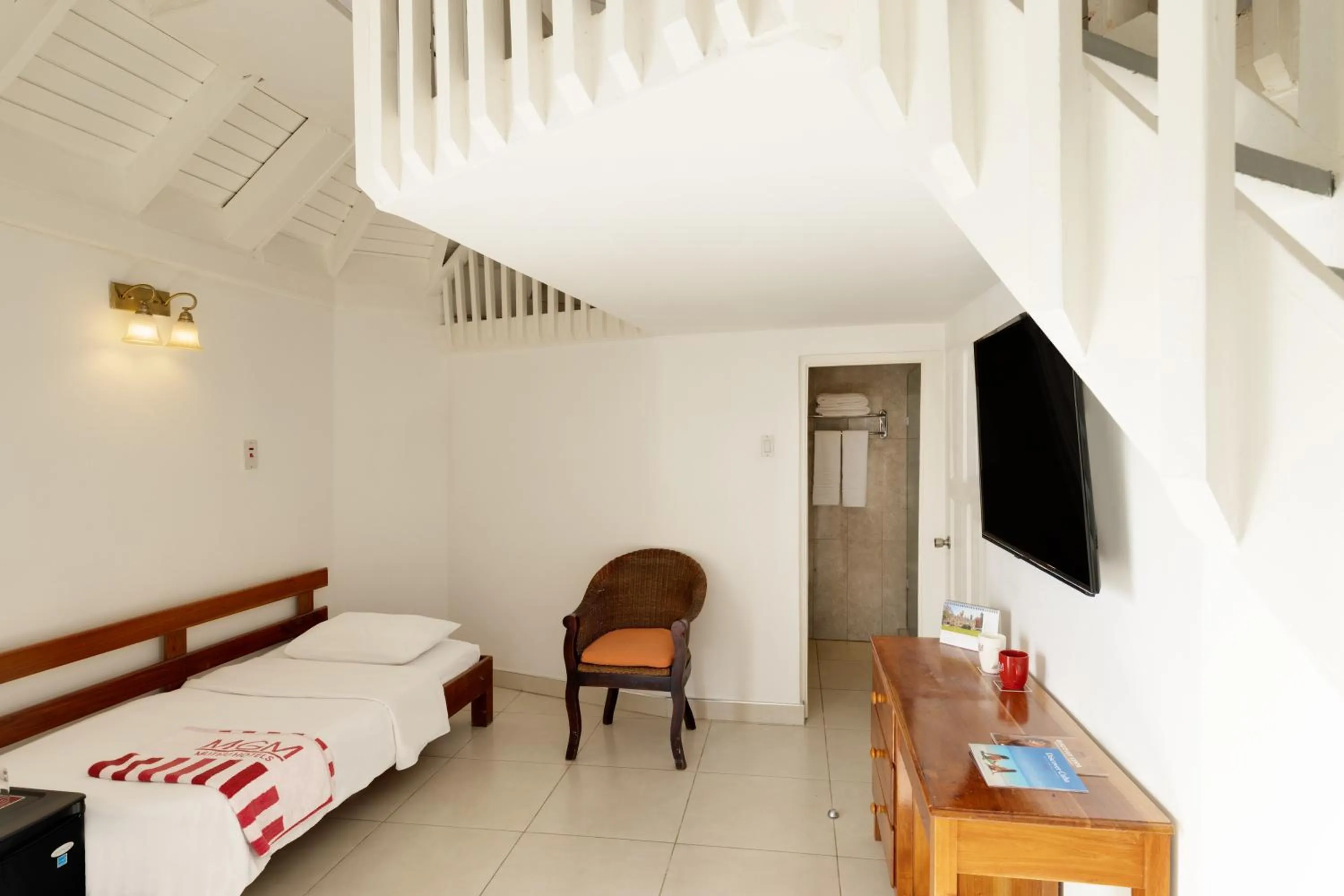 Living room, Bed in Grand Muthu Runaway Bay Club Caribbean