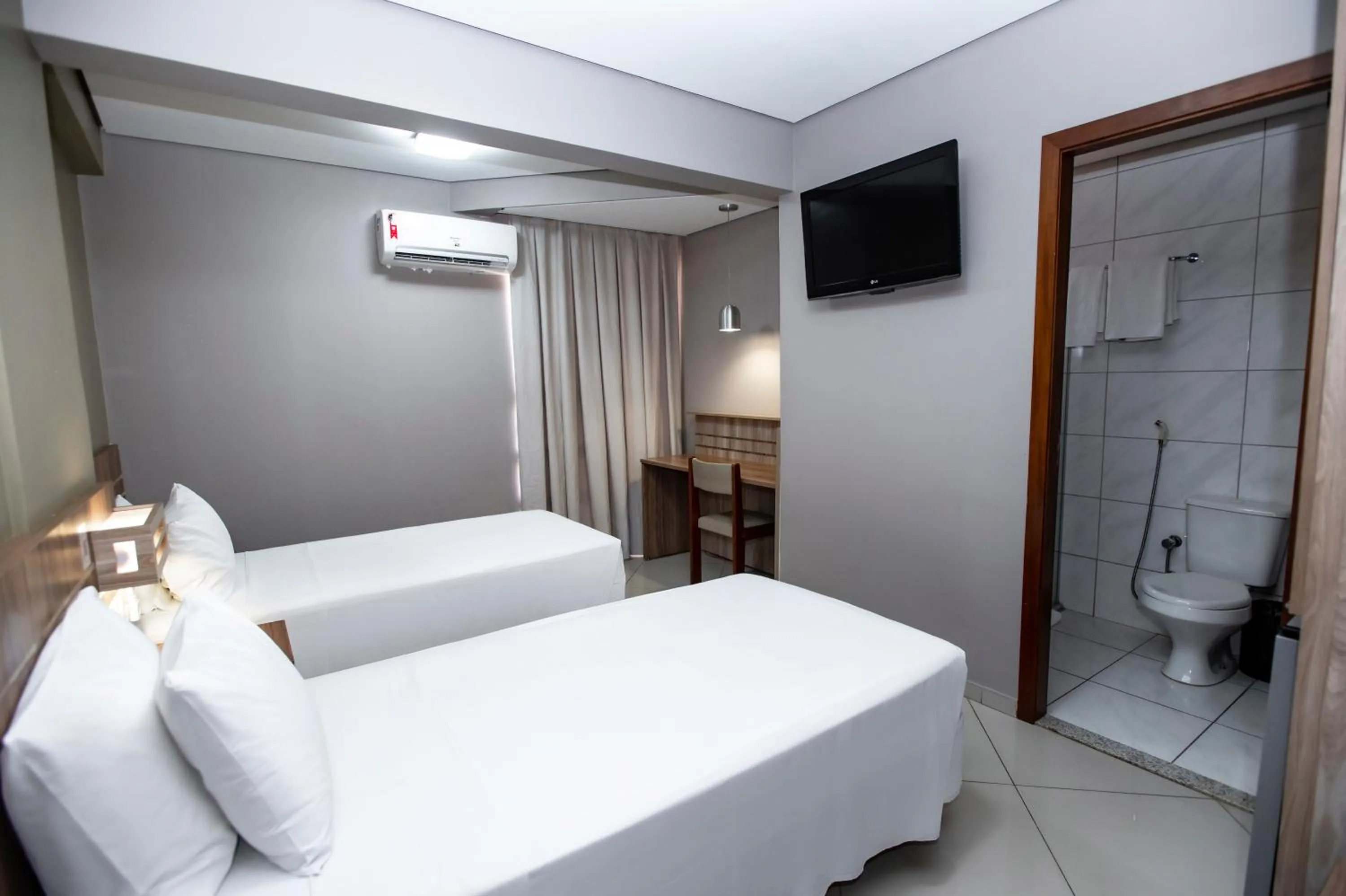 Bed in Paiaguás Palace Hotel