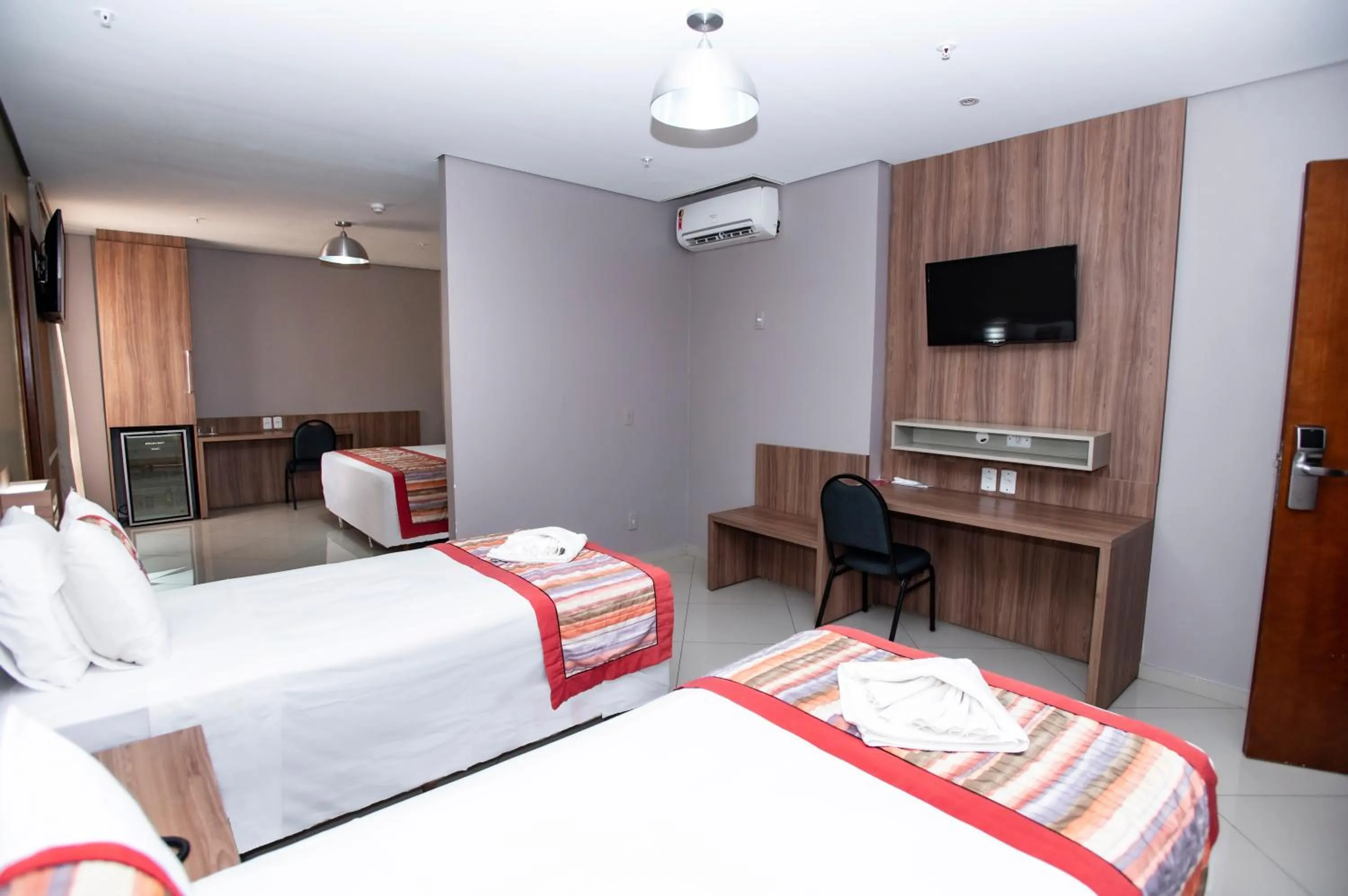 Bed in Paiaguás Palace Hotel