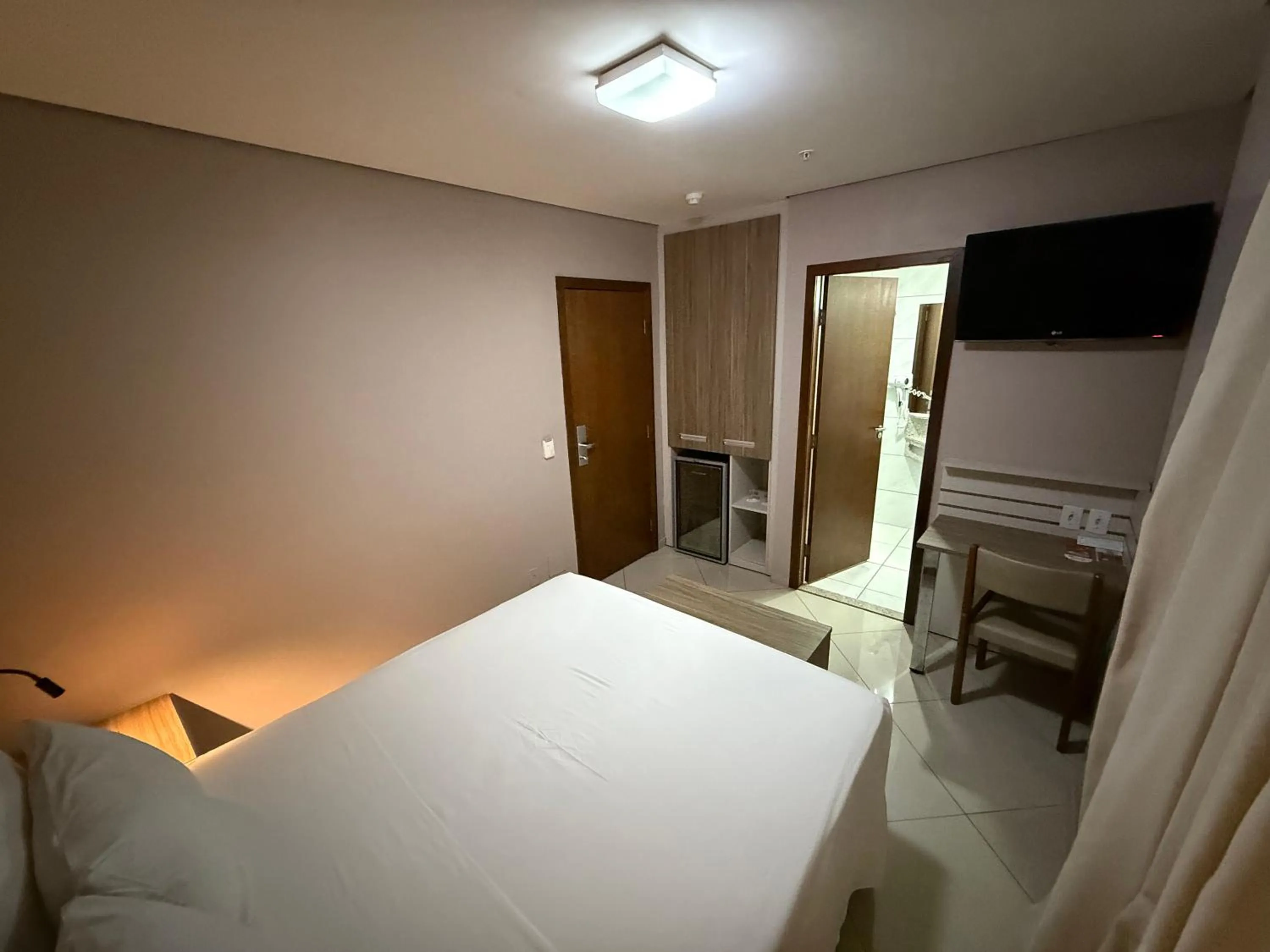 Bed in Paiaguás Palace Hotel