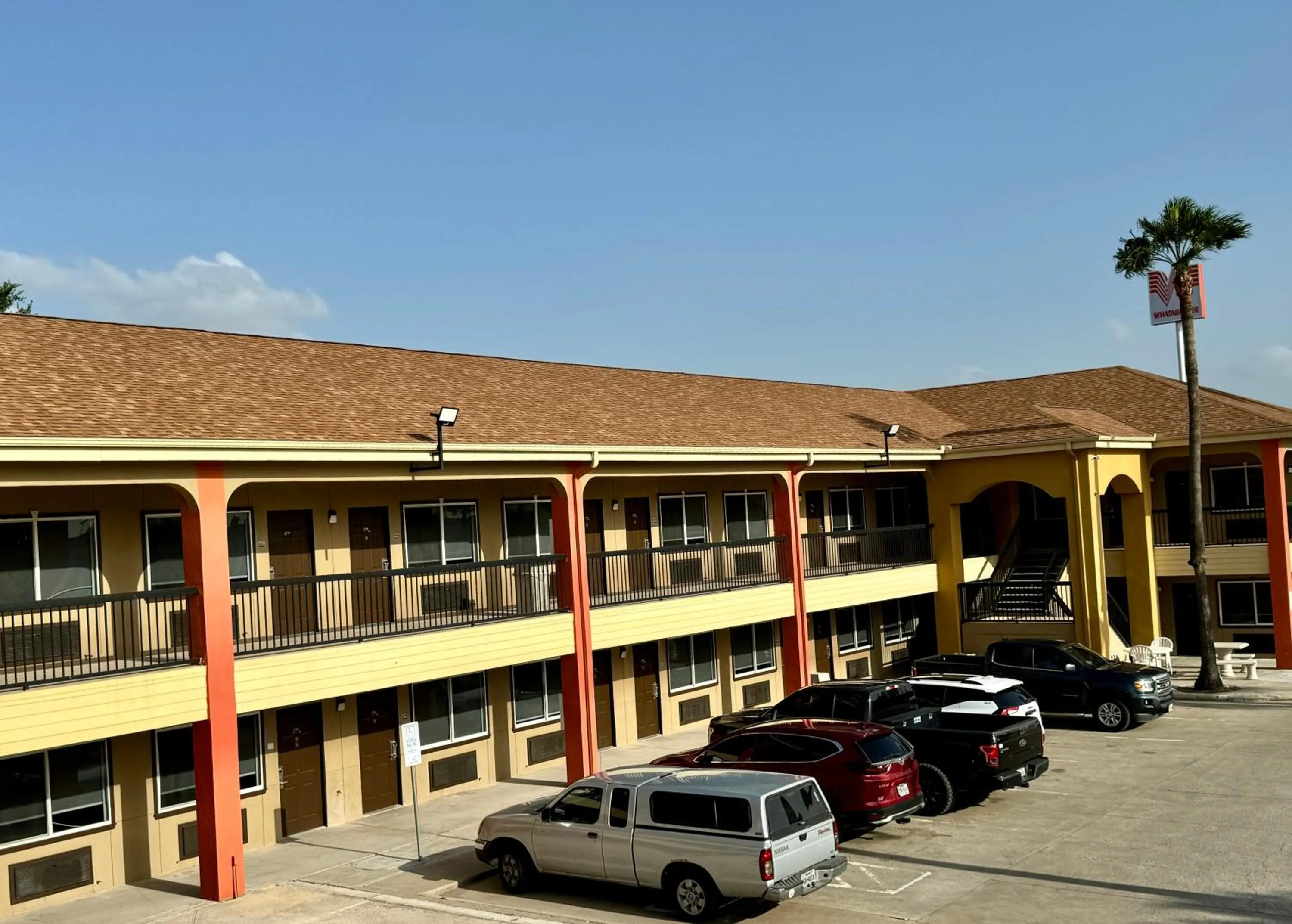 Property building in Texas Inn and Suites City Center at University Dr.
