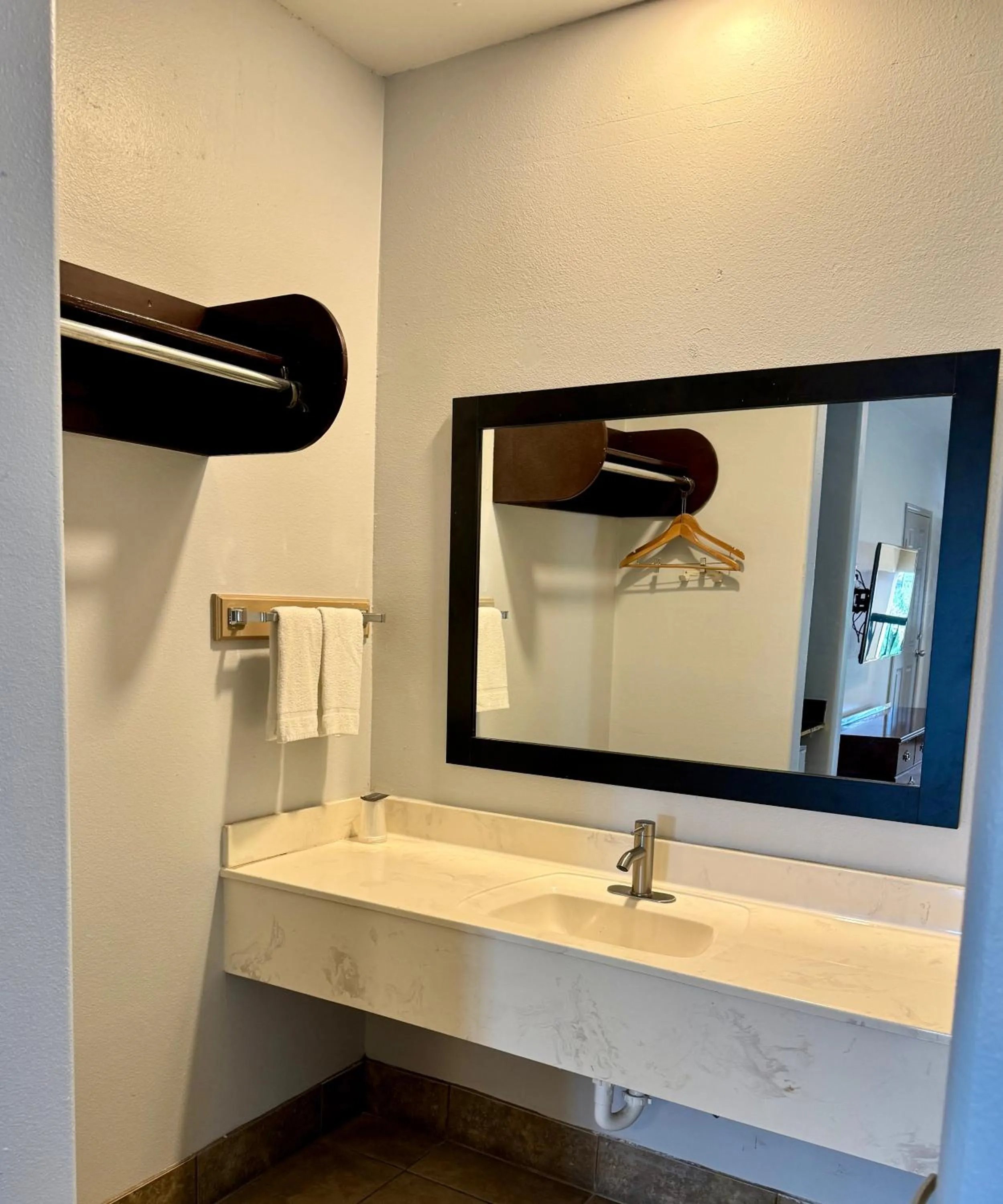 Bathroom in Texas Inn and Suites City Center at University Dr.