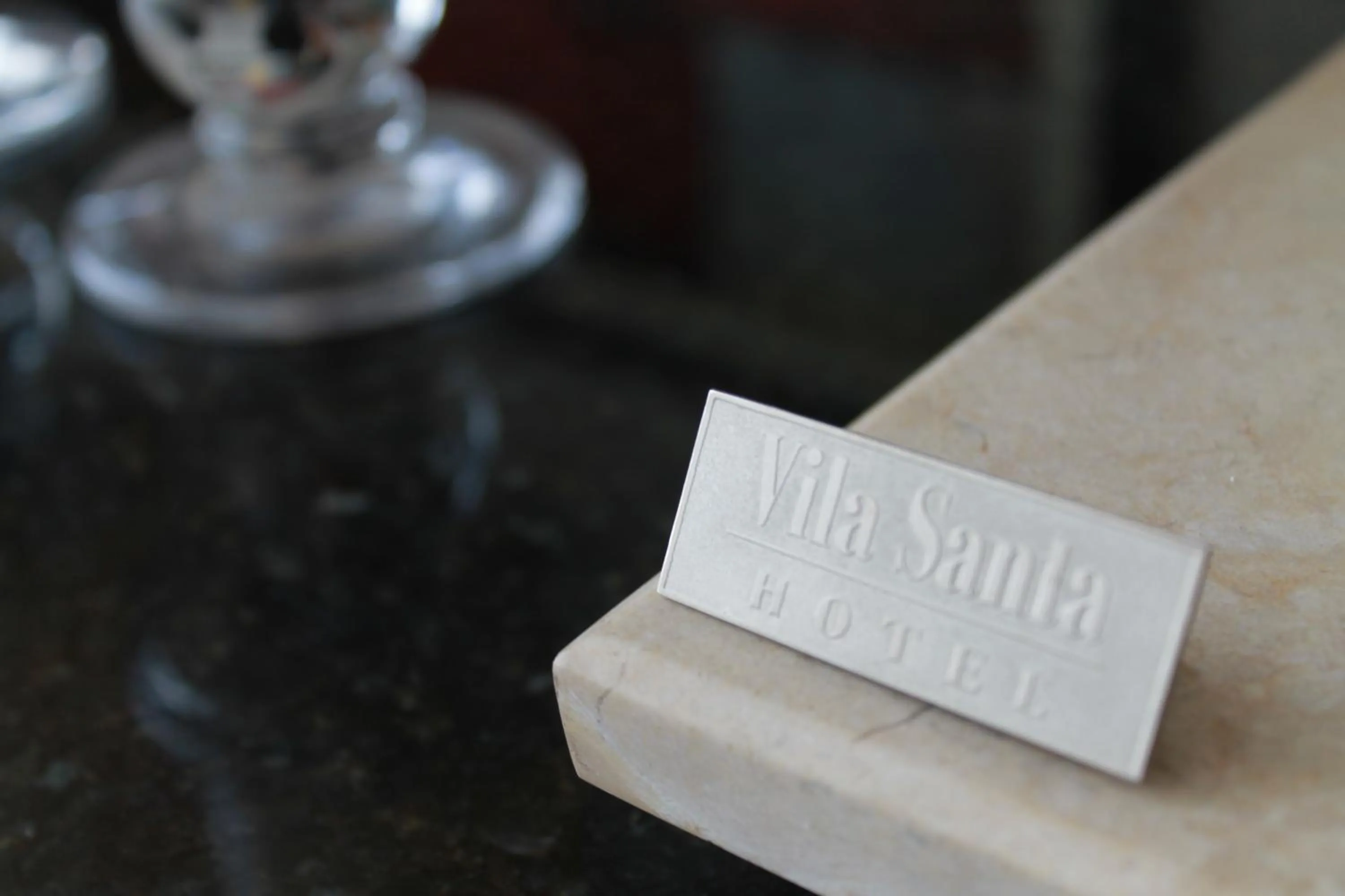 Property logo or sign in Hotel Vila Santa