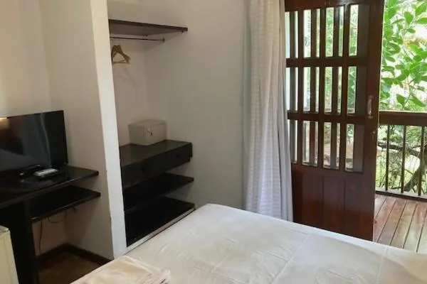 Bed in Pousada Coqueiro Verde