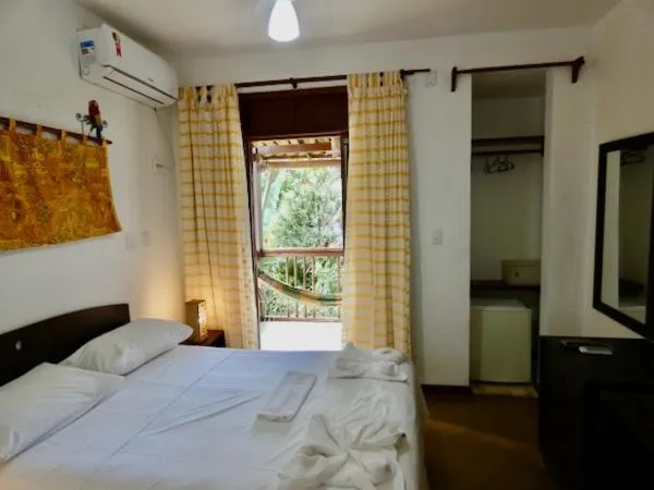 Bed in Pousada Coqueiro Verde