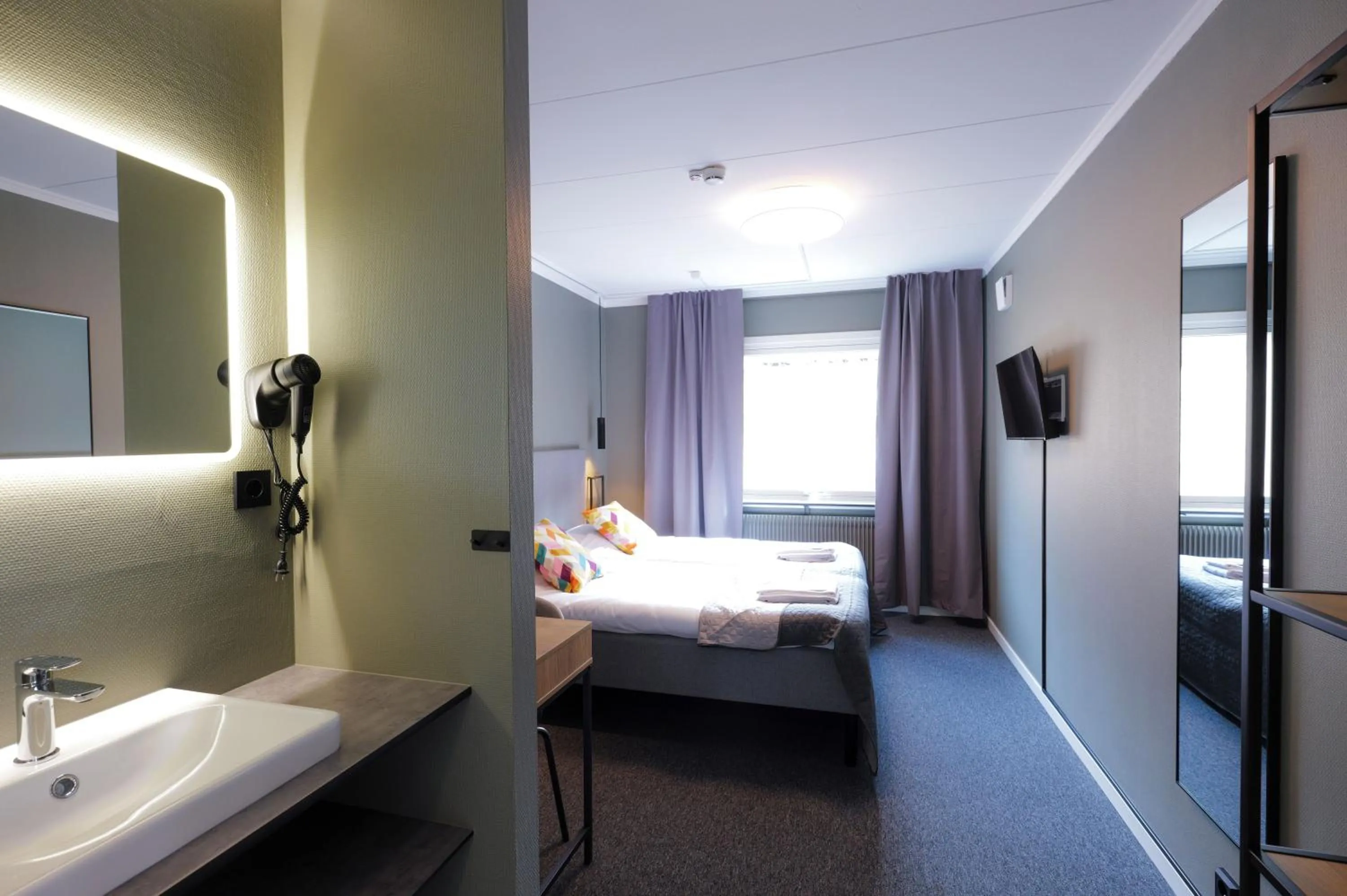 Photo of the whole room, Bed in Hotell Veckefjärden