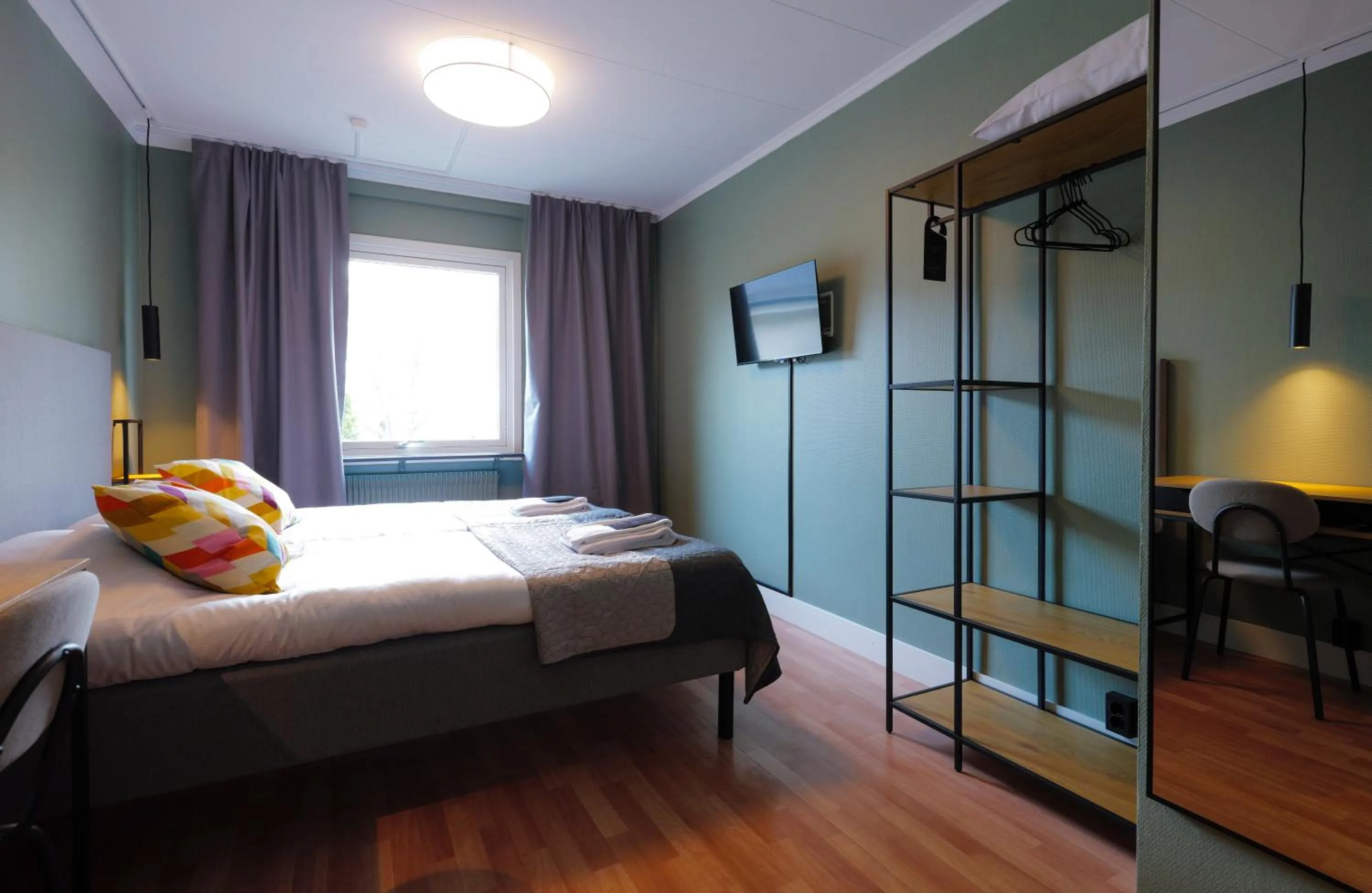 Photo of the whole room, Bed in Hotell Veckefjärden