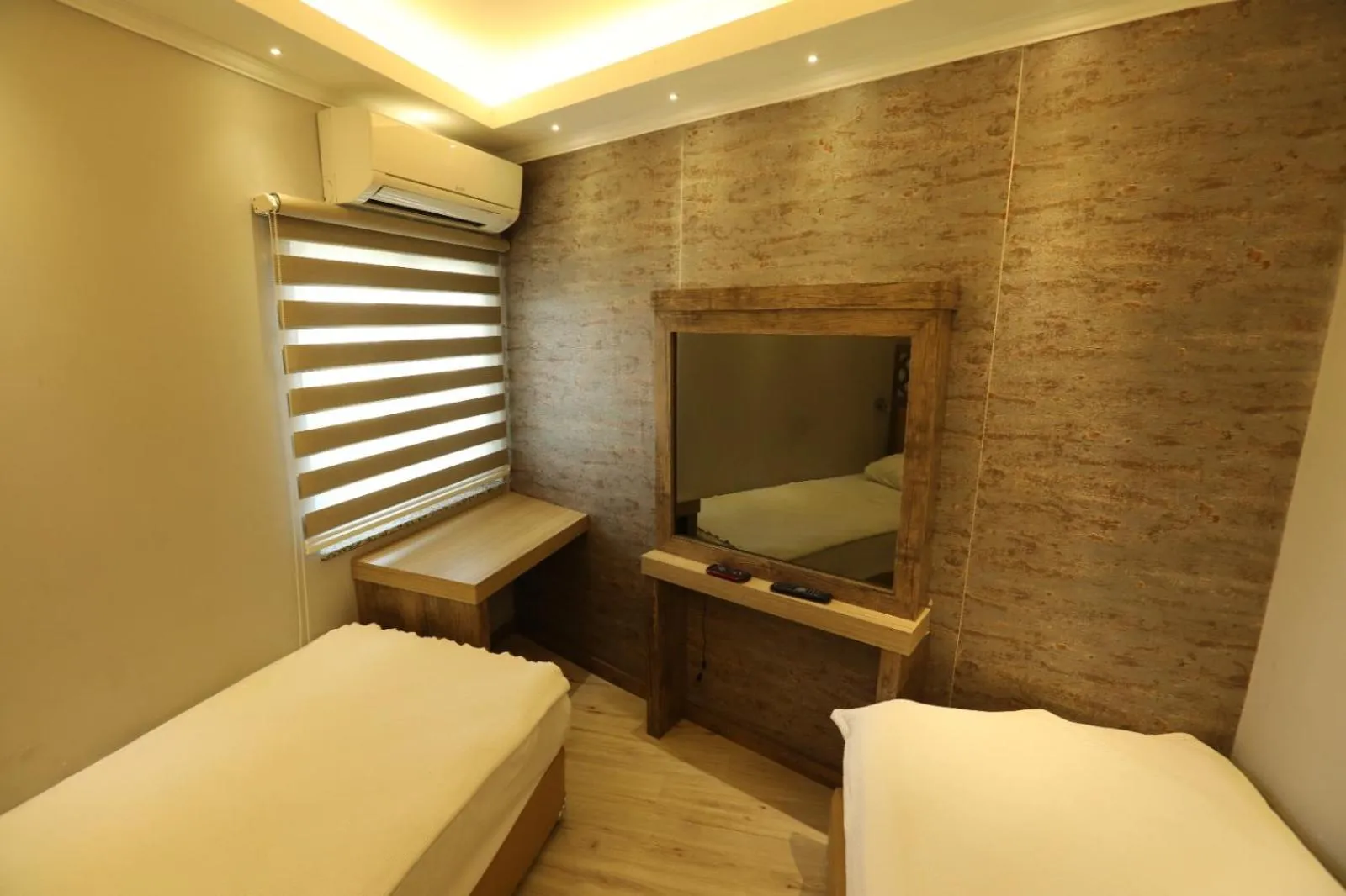 Bed in Unluselek Hotel