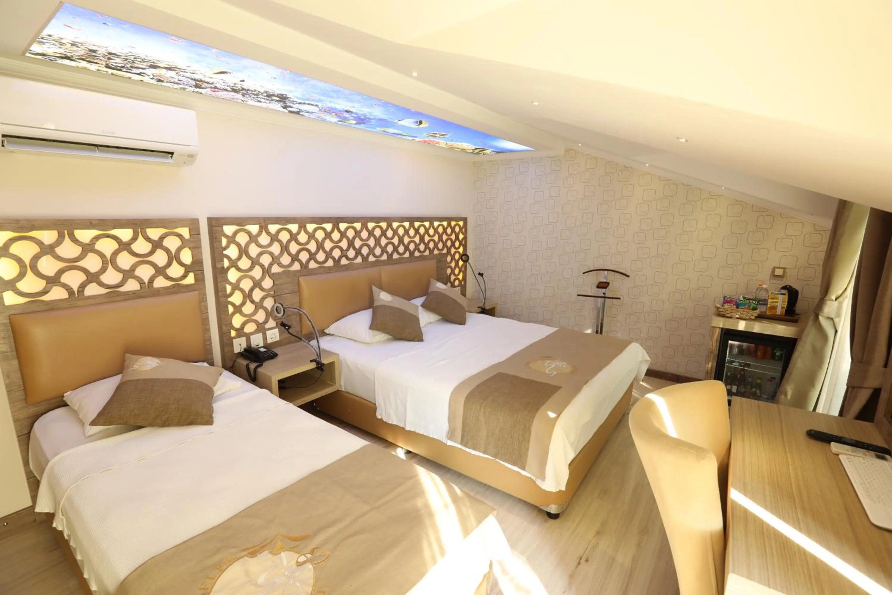 Bed in Unluselek Hotel