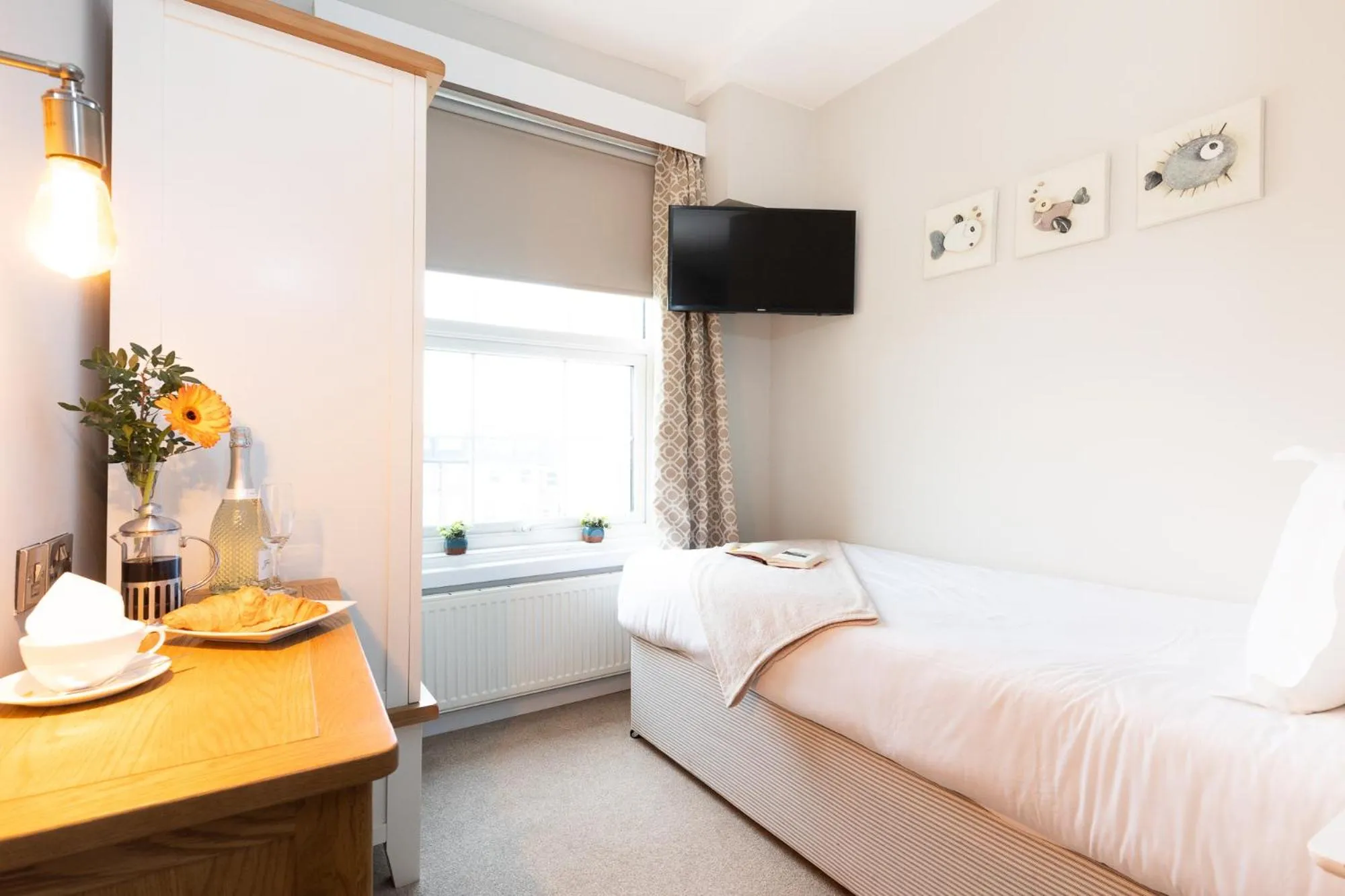 Bed in The Clarence Gardens Hotel, BW Signature Collection