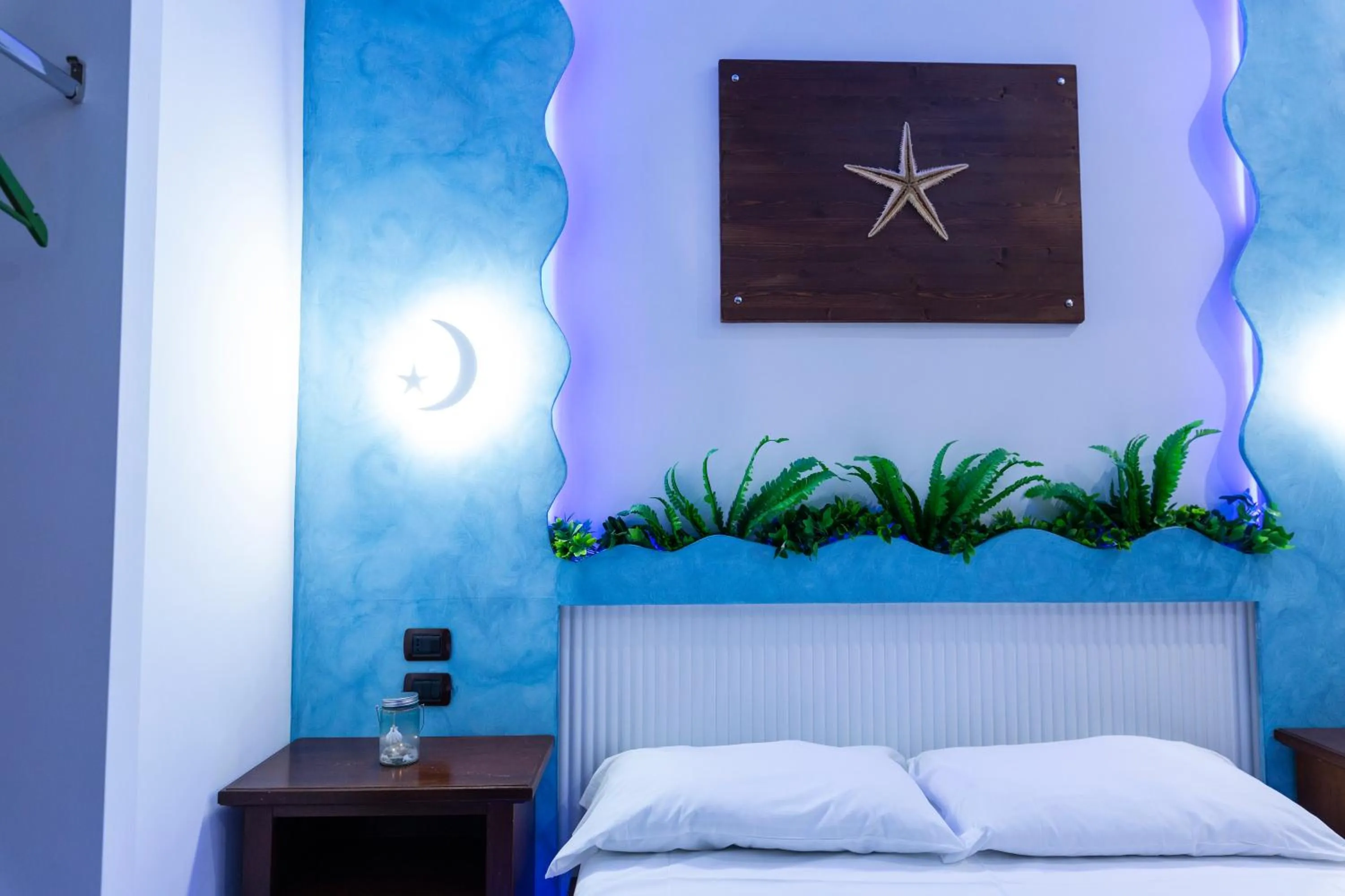 Bed in Pompei Luxury Rooms