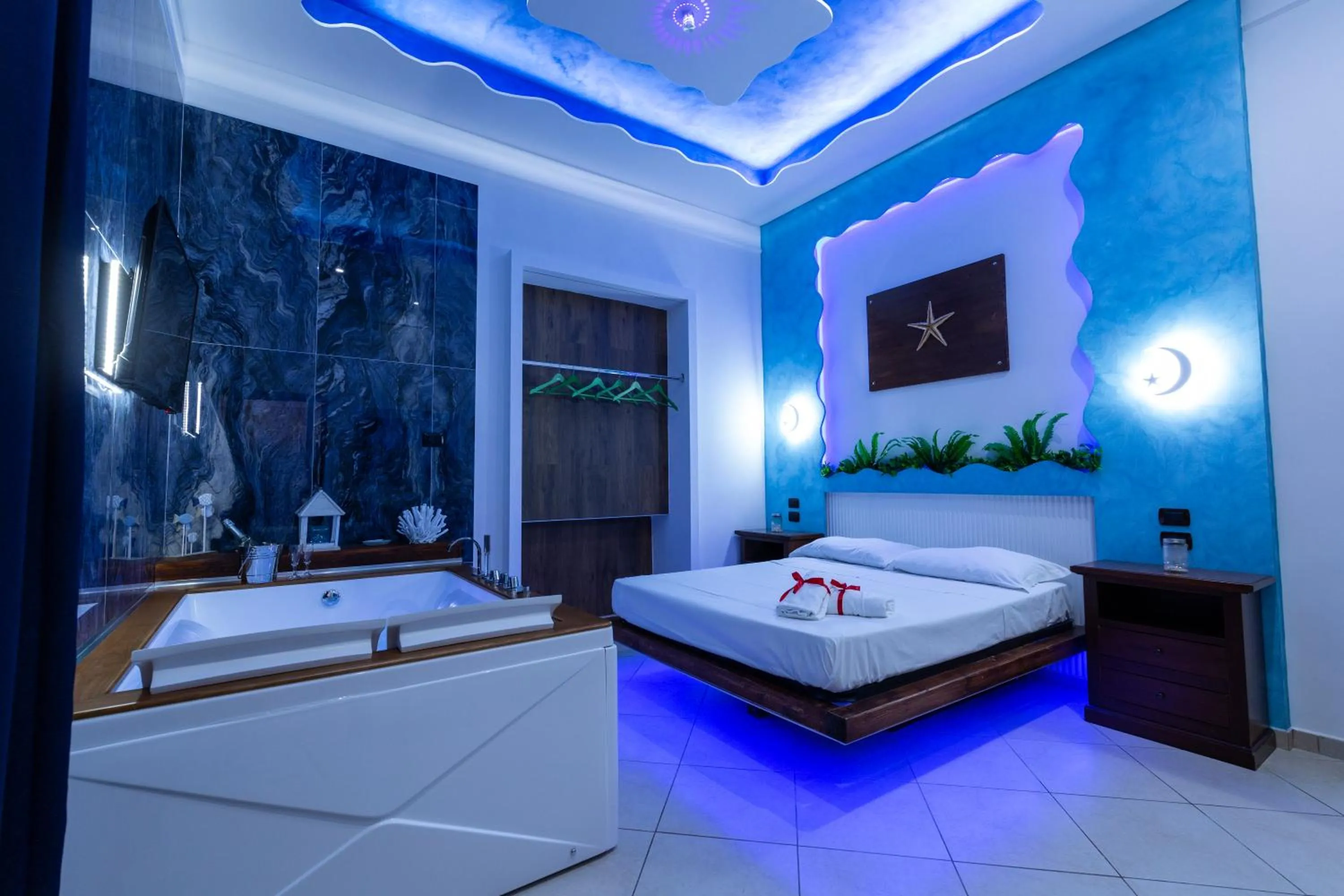 Bed in Pompei Luxury Rooms